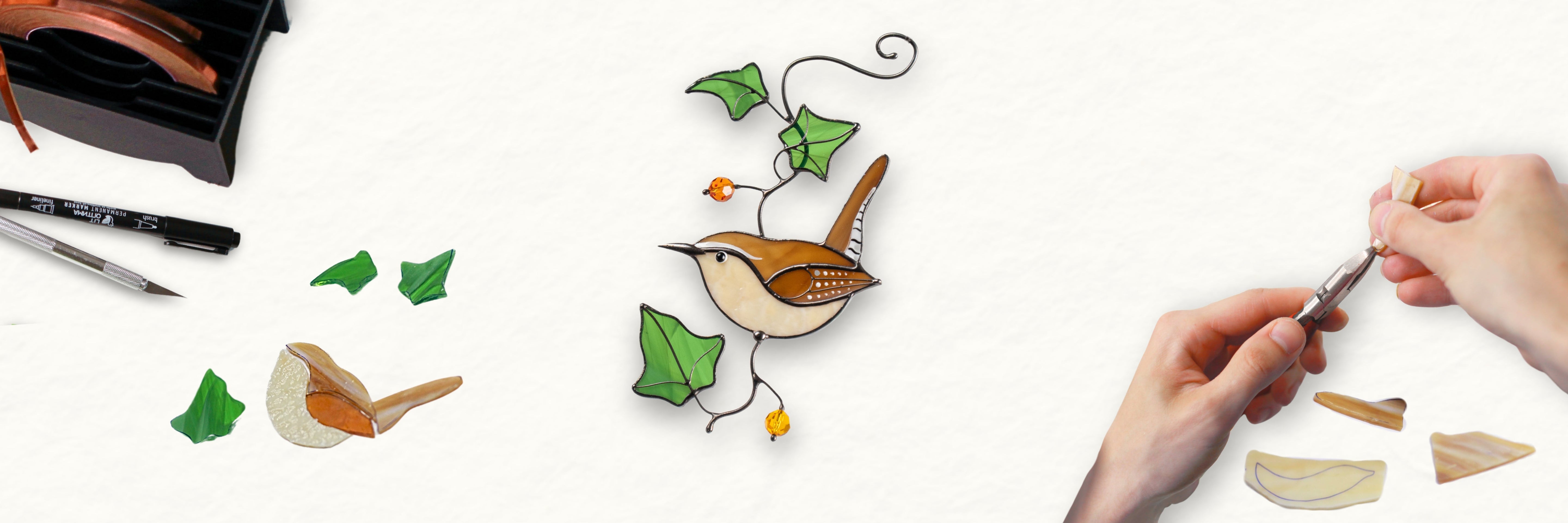 Stained glass birds and insects