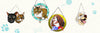 Custom stained glass pet portraits from your photo: two cats, a calico cat in a turquoise frame, a spaniel with a flag bandana and a golden retriever
