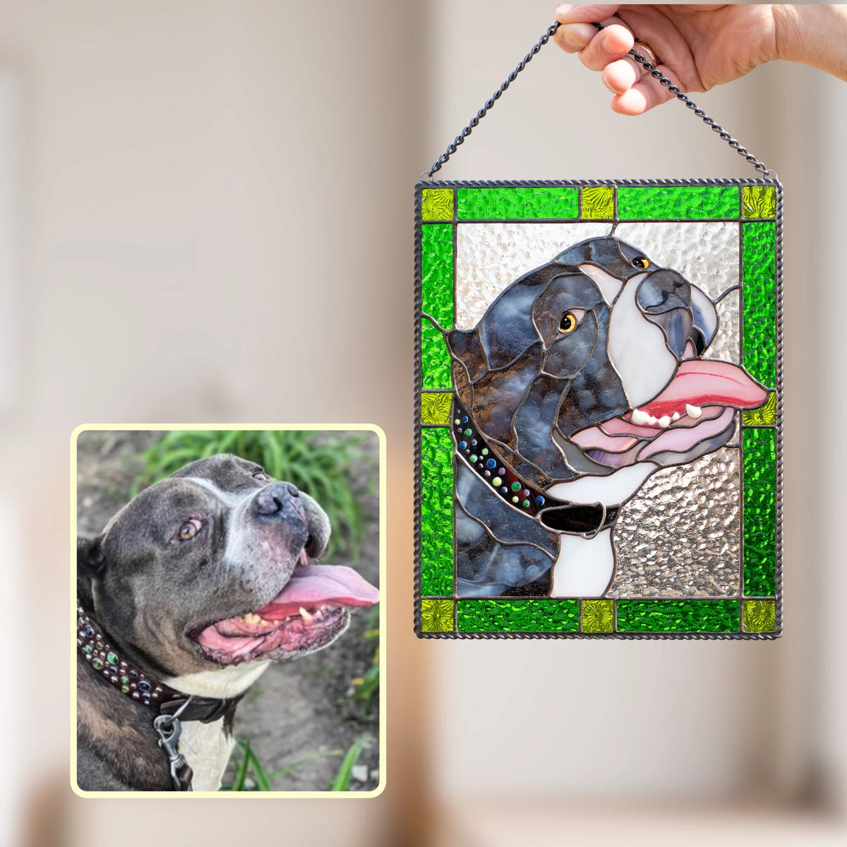Custom pet portrait stained glass of a happy gray and white dog with its tongue out and a studded collar, framed in green textured glass beside the pet photo - handmade stained glass dog portrait