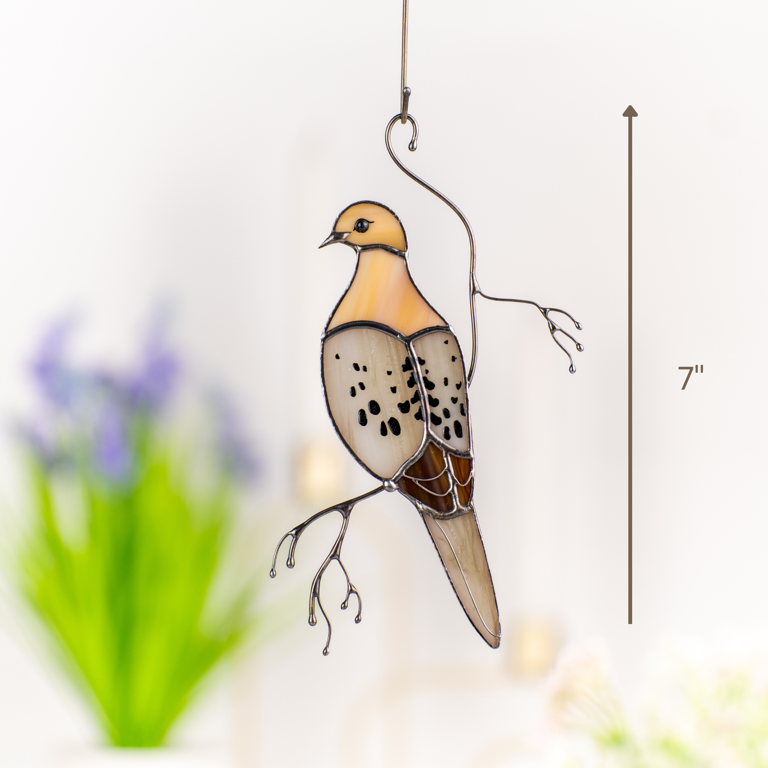 Vertical image of mourning dove suncatcher with ruler scale showing its 7 inch height and branch detail.