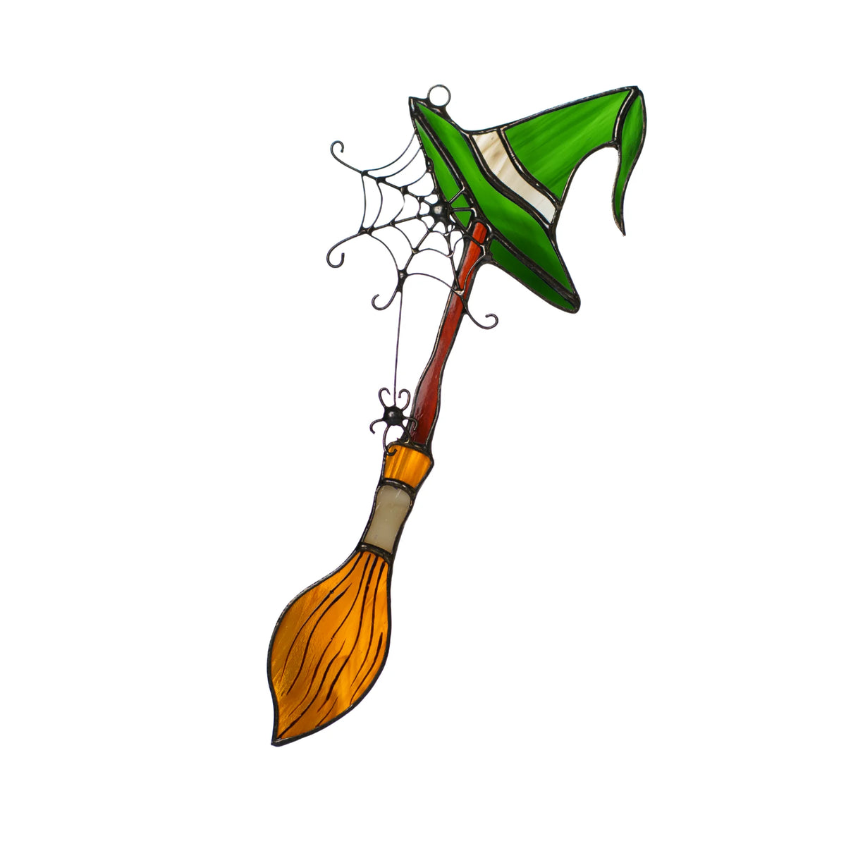 Handmade Halloween stained glass suncatcher shaped as a witch's broom with a green witch hat, amber bristles, a wire spiderweb and a small spider on a thread - witchy window decor