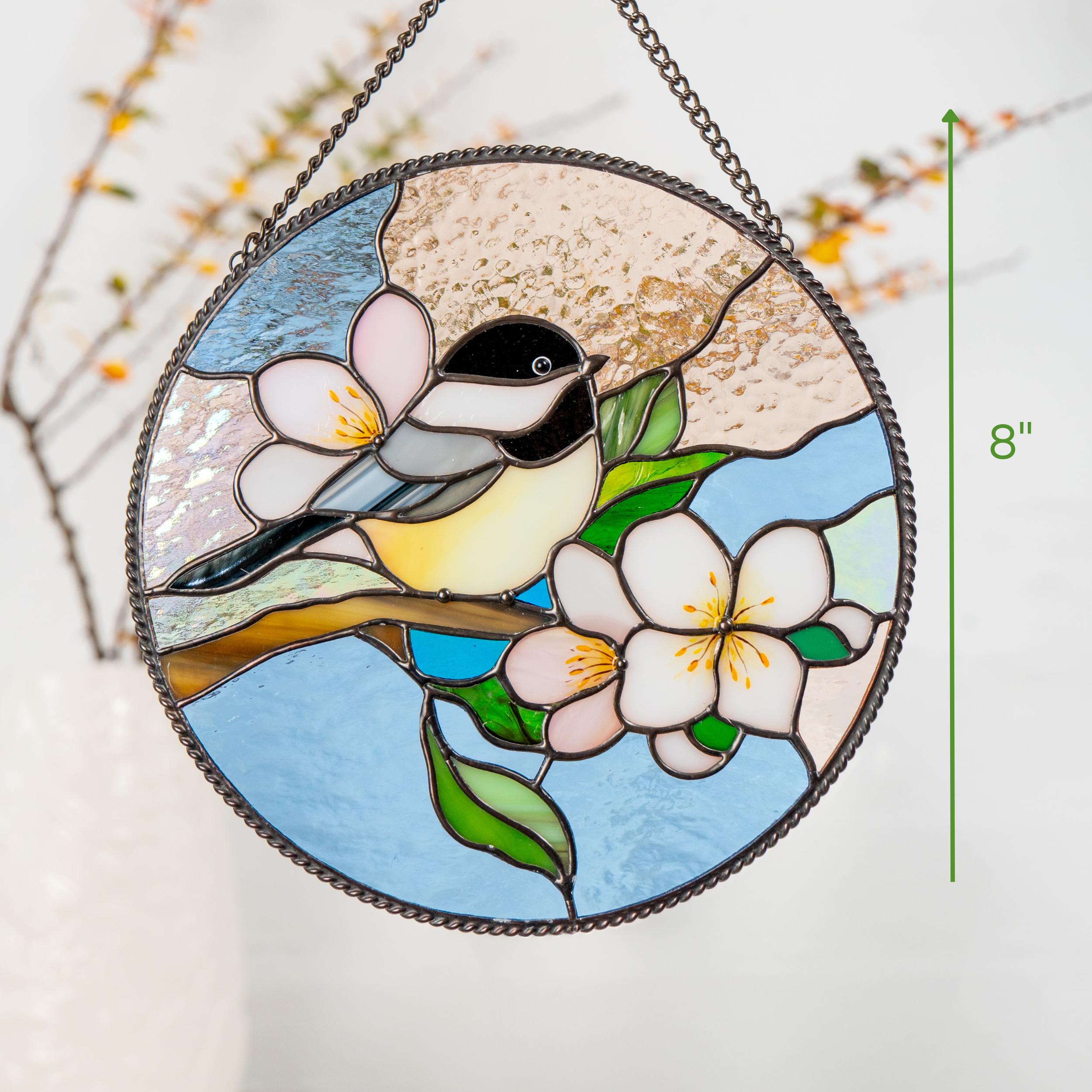 Measuring image showing stained glass chickadee panel next to a vase, with vertical height labeled “8 inches”