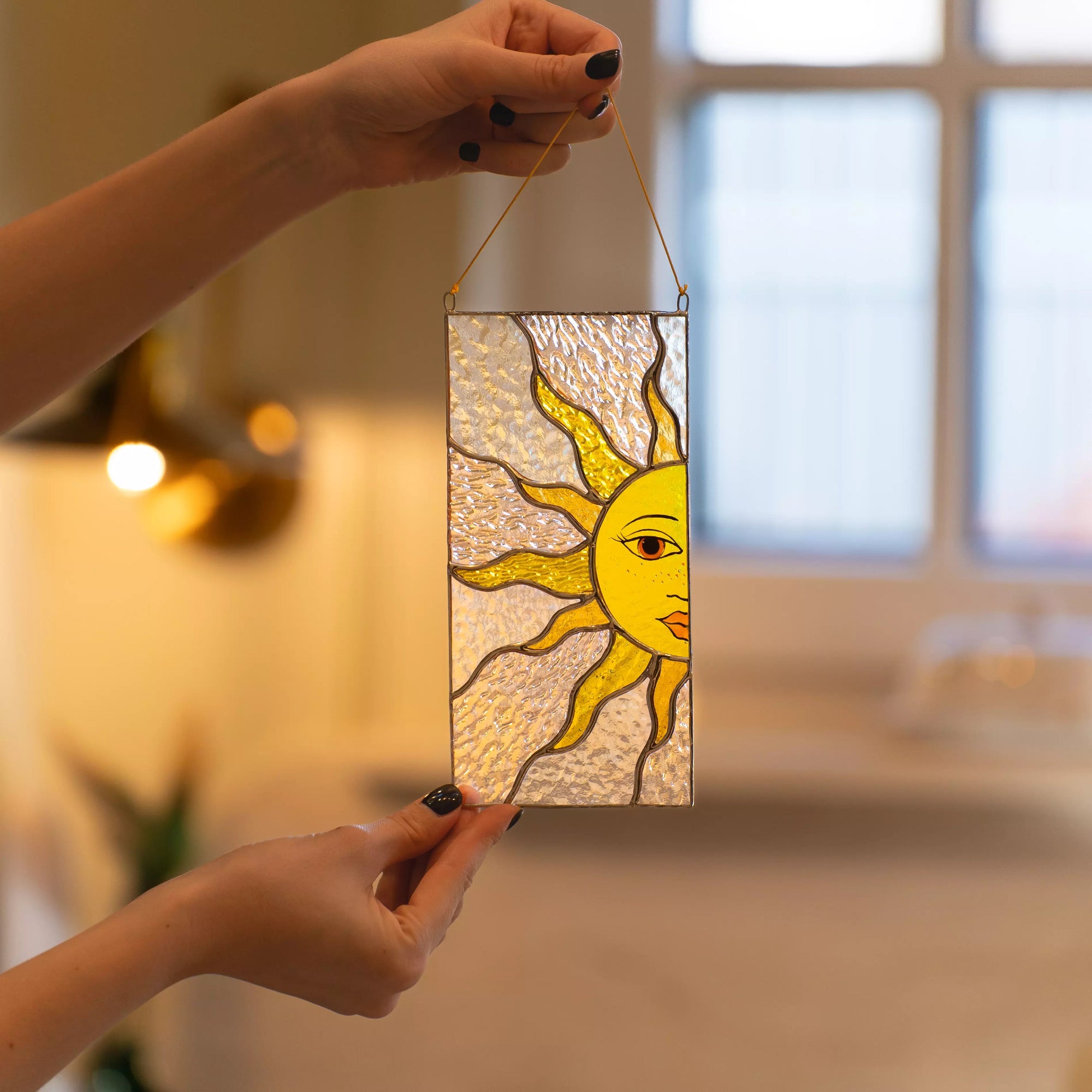 Interior stained glass suncatcher, sun face window decor, cozy home glass art, celestial handmade hanging ornament.