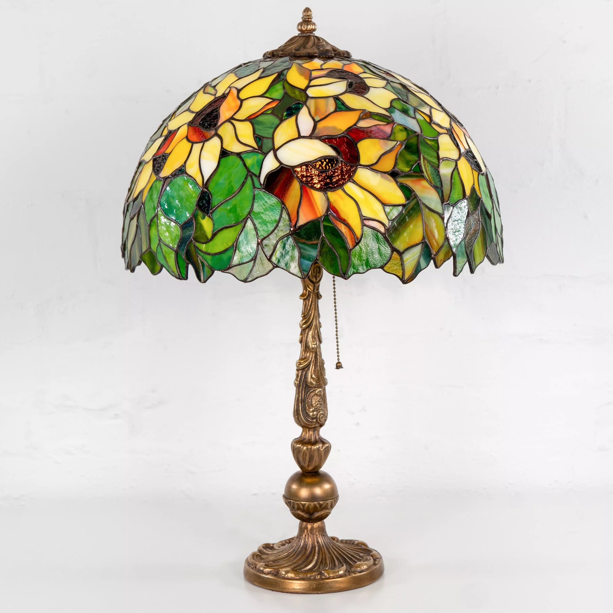 Vibrant stained glass sunflower table lamp with bronze ornate base