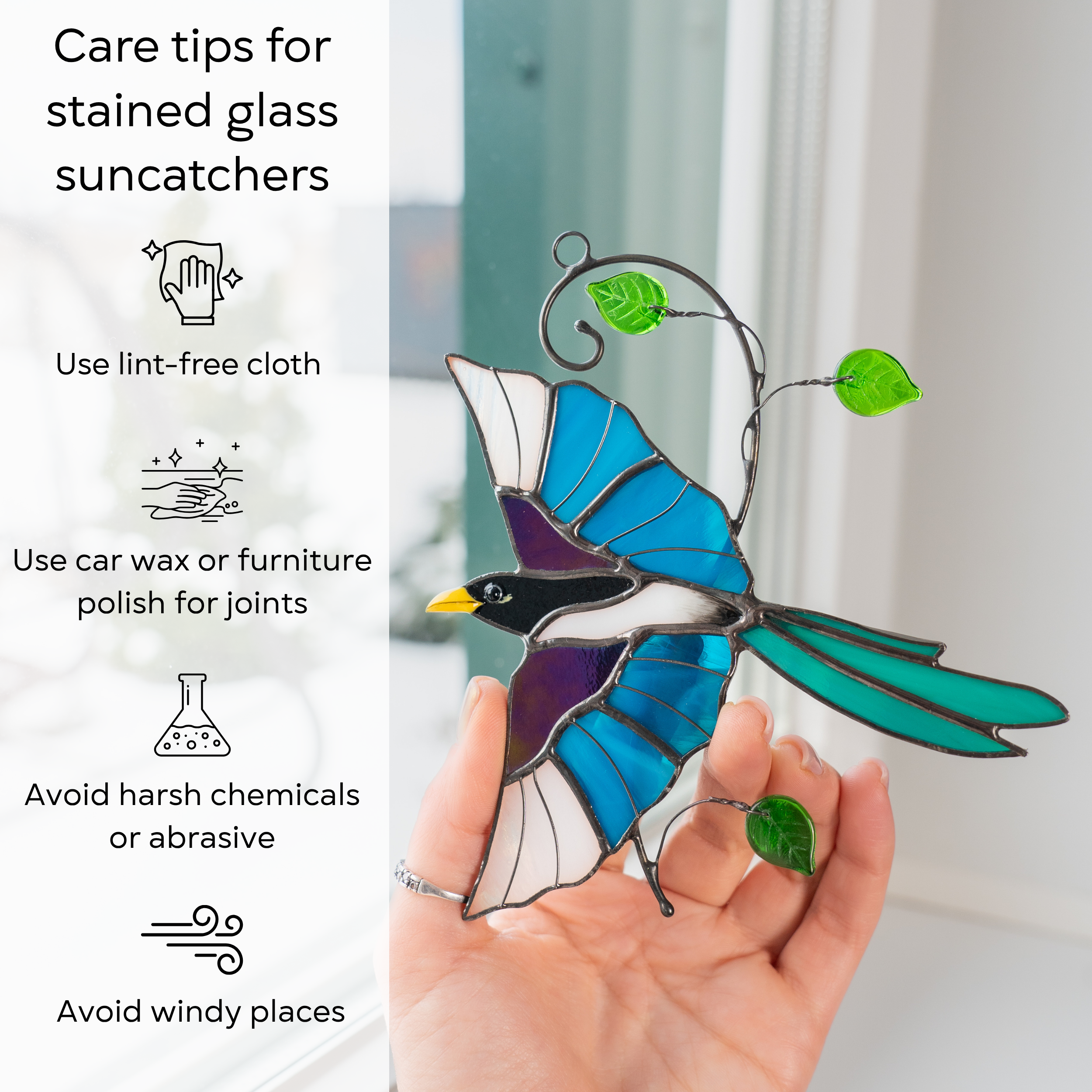 Handmade stained glass magpie decor, featuring elegant blue shades and green leaf accents, are instruction beside: use lint-free cloth, use wax polish for joints, no harsh cleaners, avoid wind.