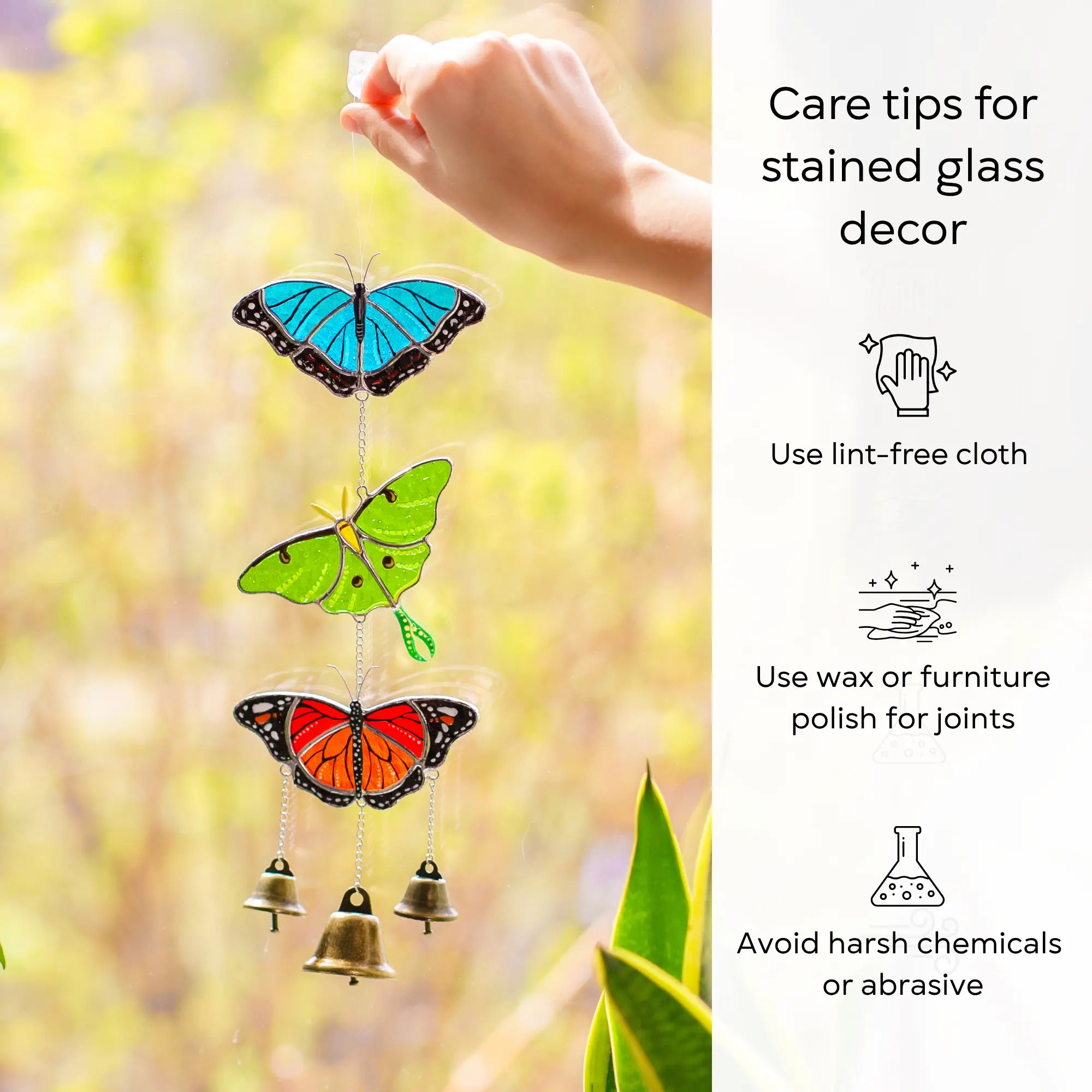 Butterfly-shaped stained glass wind chime with care tips on a blurred natural background: use lint-free cloth, polish joints with car wax or furniture polish, avoid harsh chemicals, and windy places.