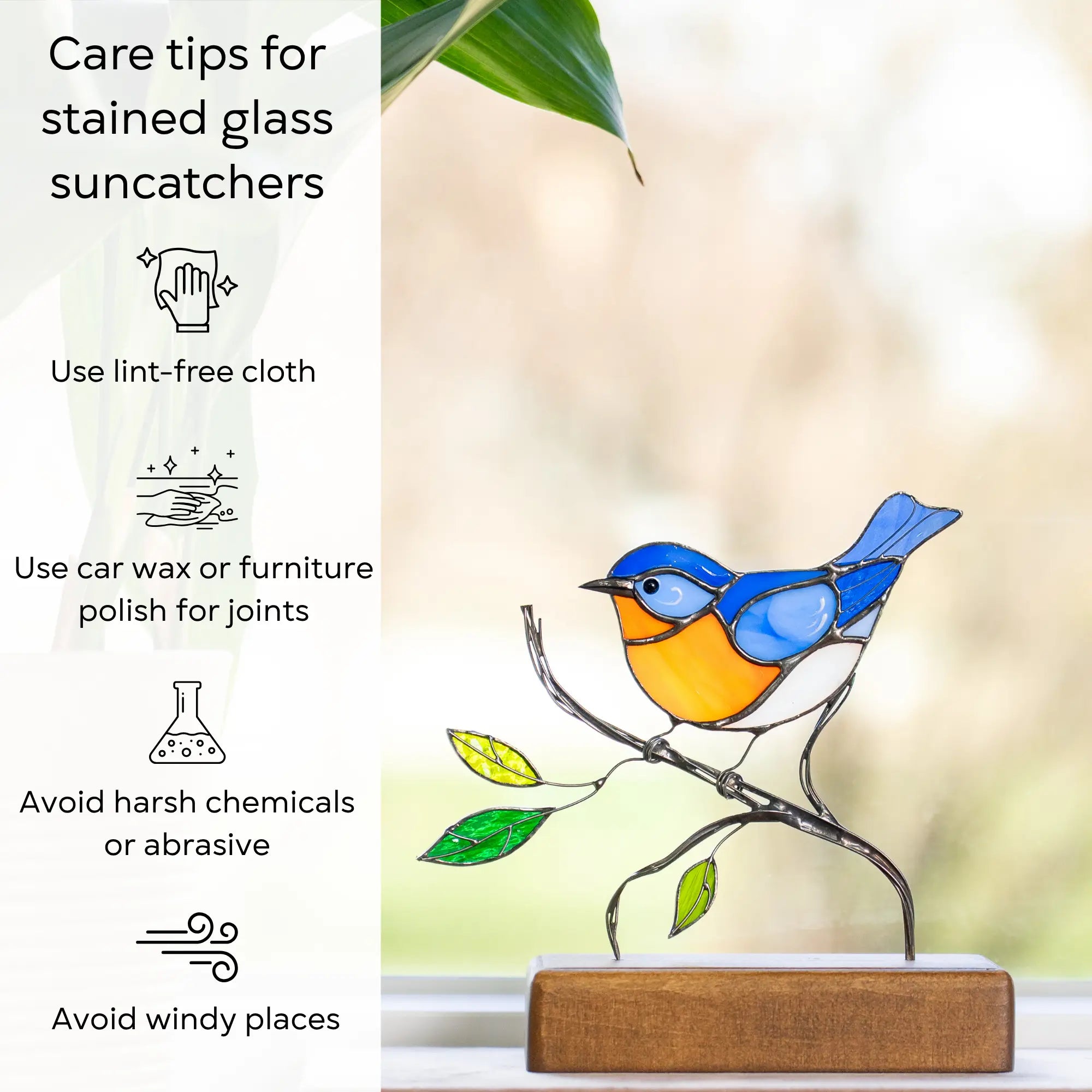 Care tips for stained glass suncatchers: lint-free cloth, car wax, avoid chemicals and wind. Bluebird stained glass decor shown.