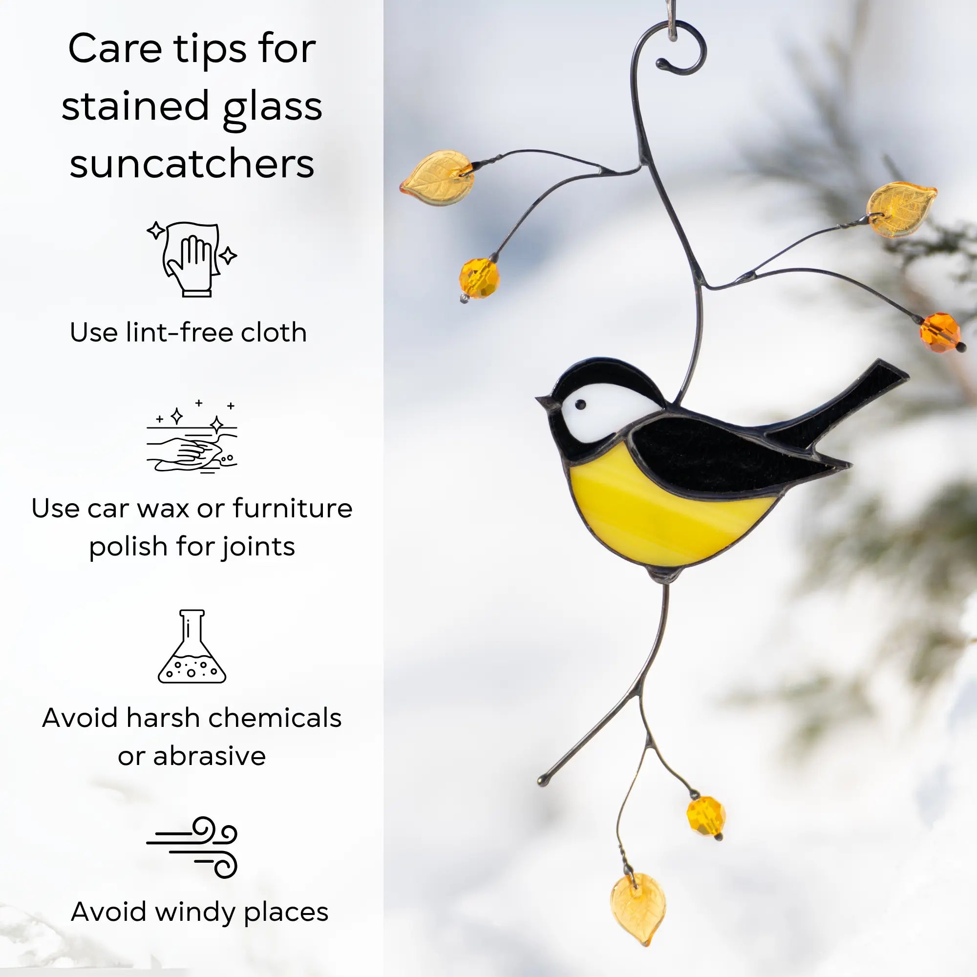 Chickadee suncatcher hanging outdoors with care instructions shown: clean with lint-free cloth, avoid harsh cleaners and wind