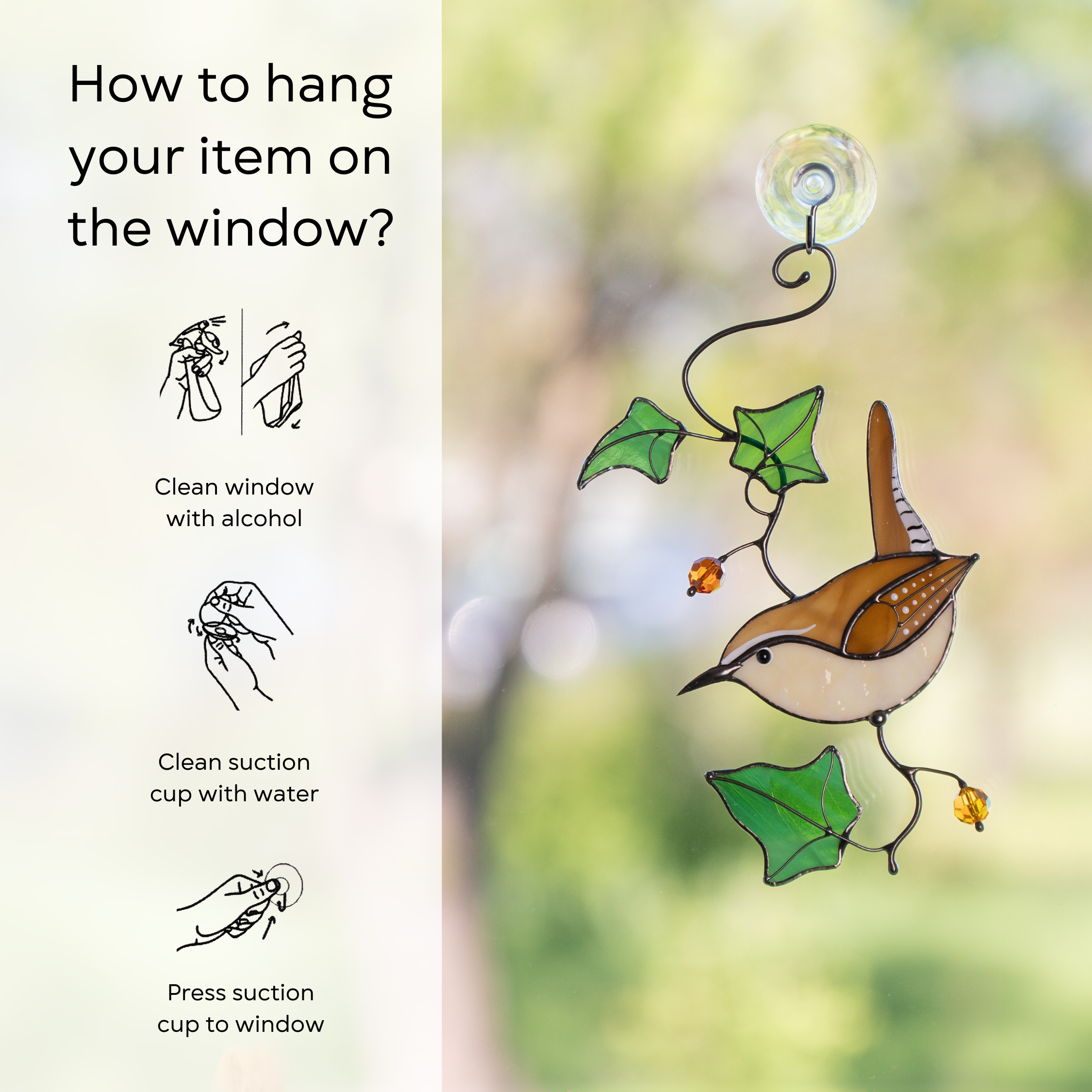 Stained glass Carolina wren suncatcher displayed on a window with hanging instructions shown on the left: clean window and suction cup, press a cup to the surface.