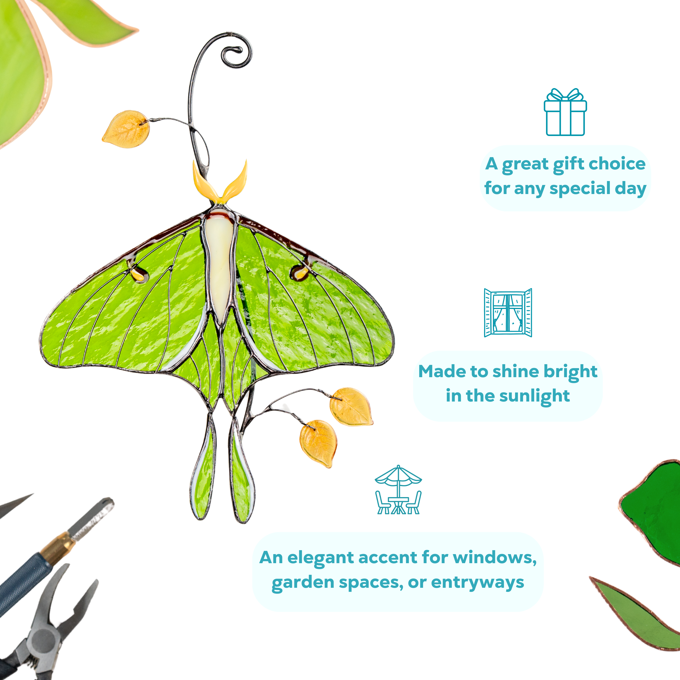 Green stained glass luna moth suncatcher with golden glass leaves, displayed on a white background, an ideal gift for any special day.