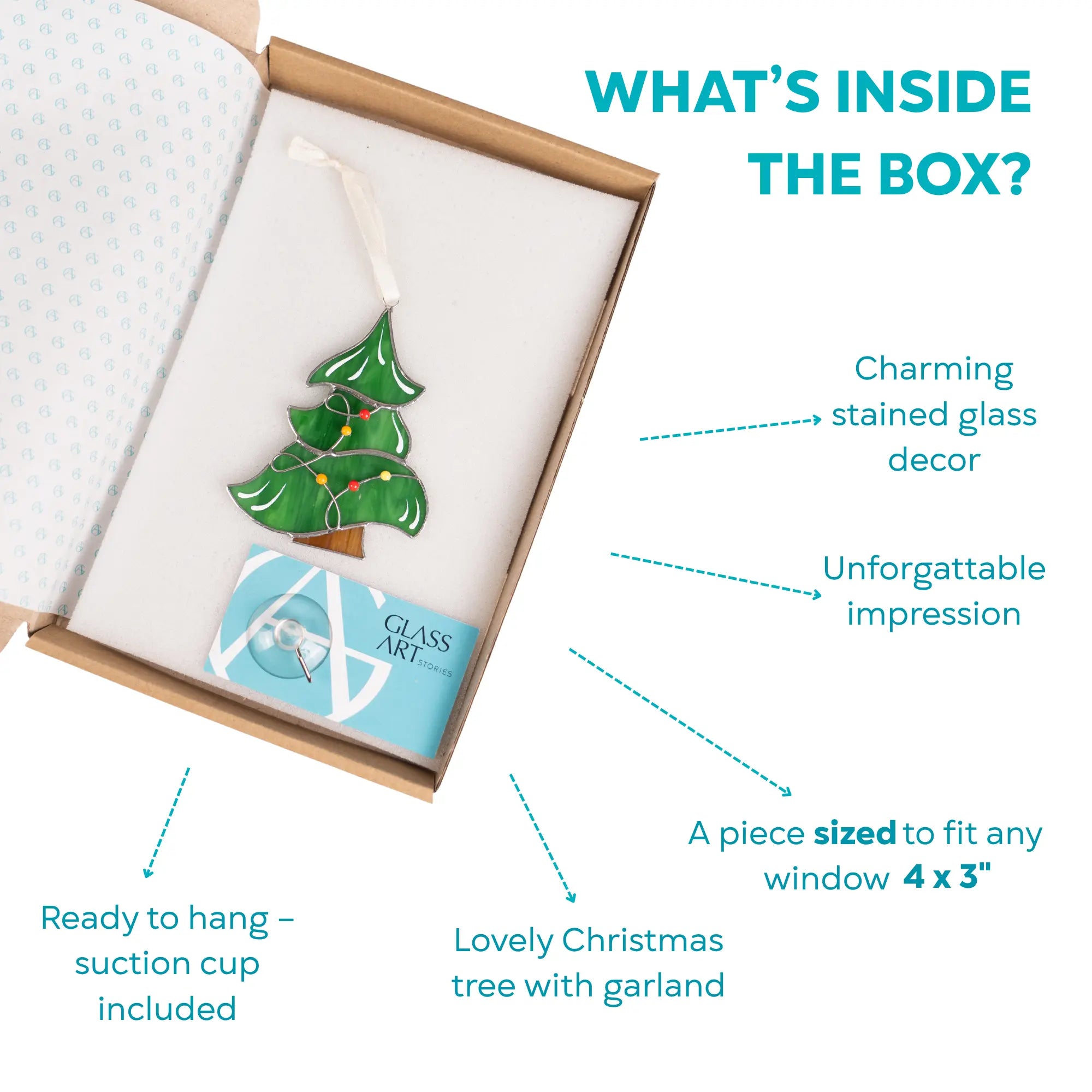 Gift box containing green stained glass Christmas tree ornament with yellow and red lights on garland, suction cup included for hanging.