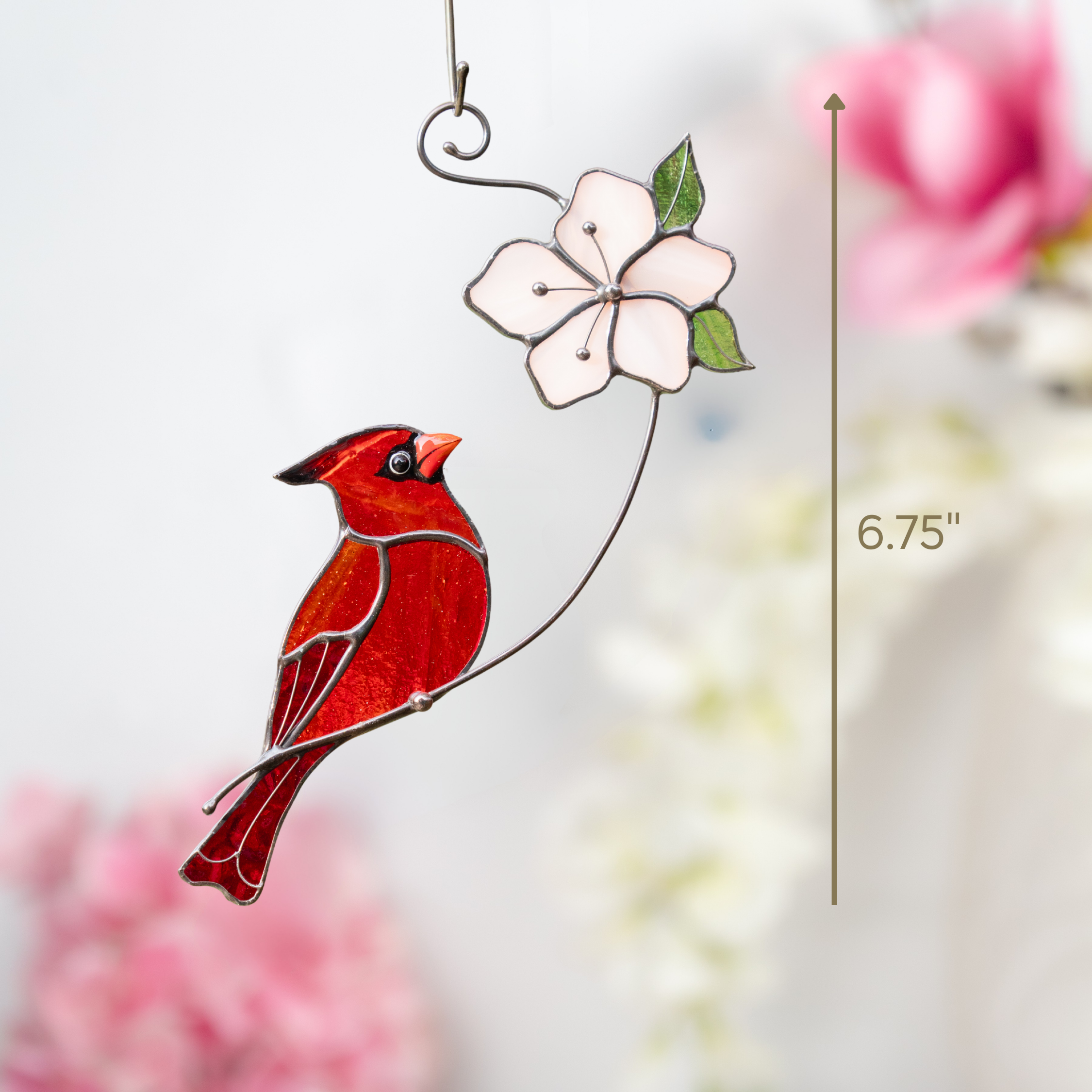 Close view of stained glass cardinal and pink flower hanging decor with a 6.75-inch height marker.