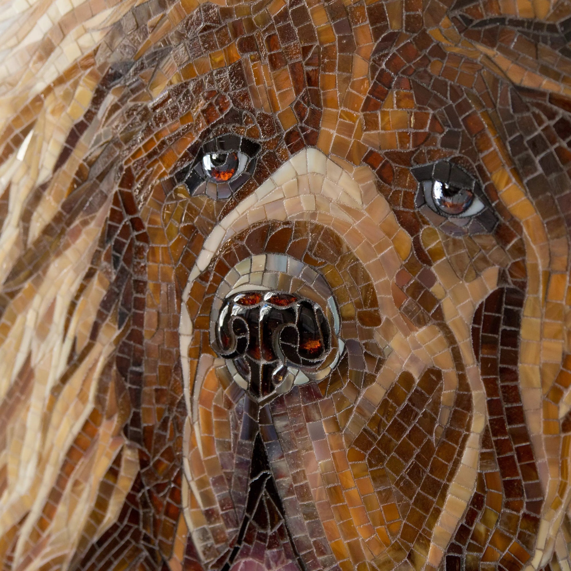 Detailed glass mosaic close-up of the Tibetan Mastiff’s eyes, snout, and flowing mane