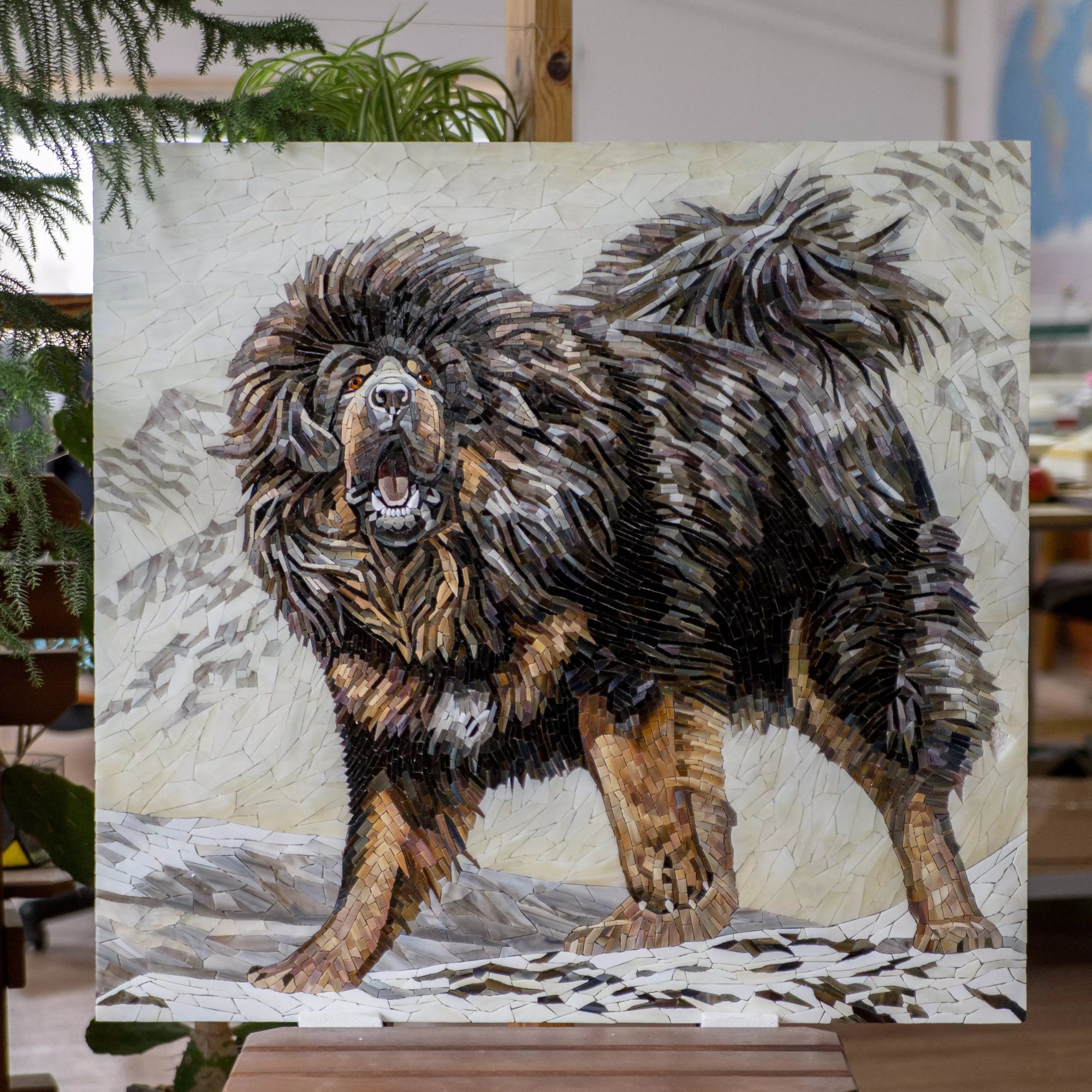 Mosaic of a mastiff dog in stained glass with natural lighting highlighting the colors.