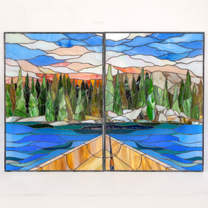 Stained glass panel with a natural landscape