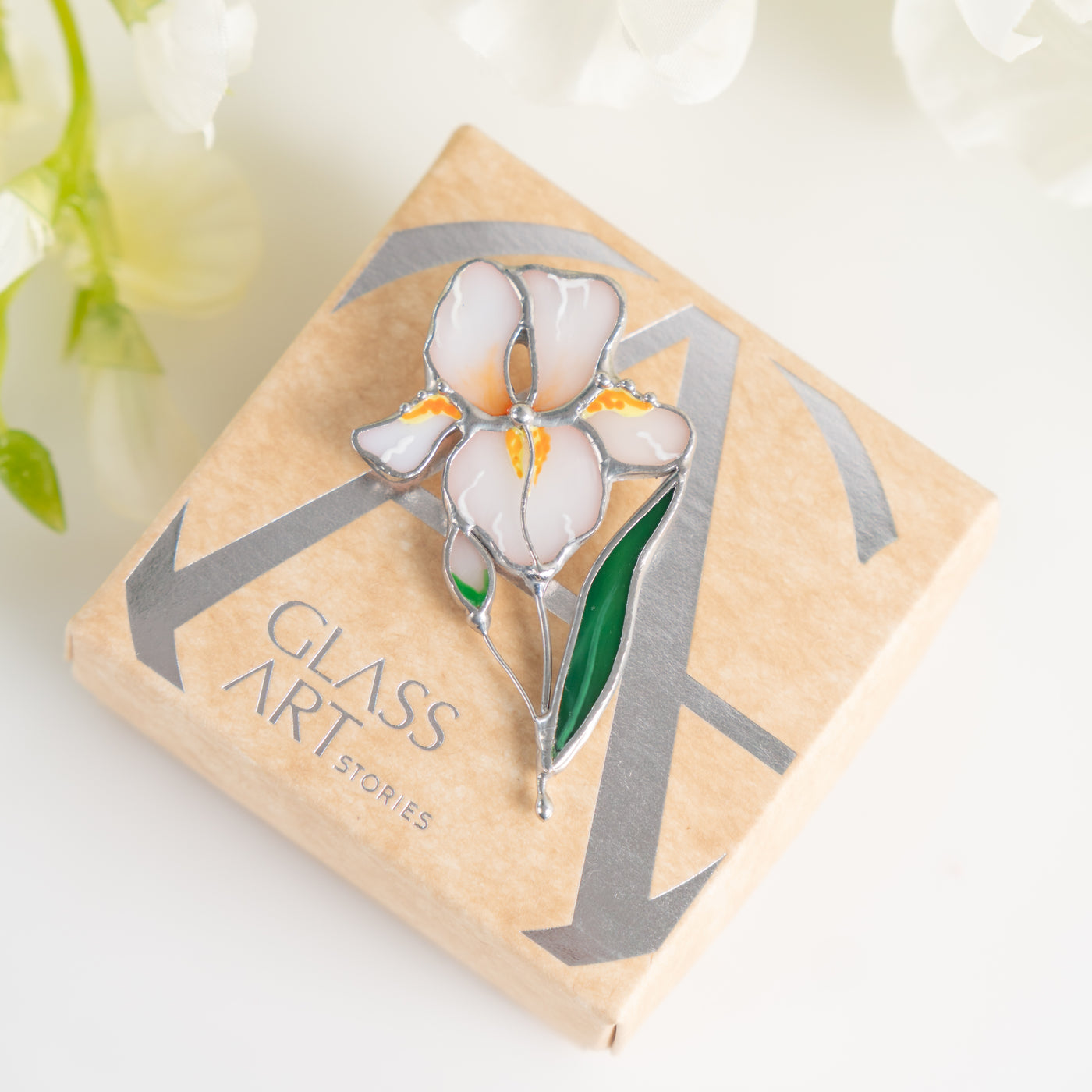 Stained glass iris flower pin with the brand box