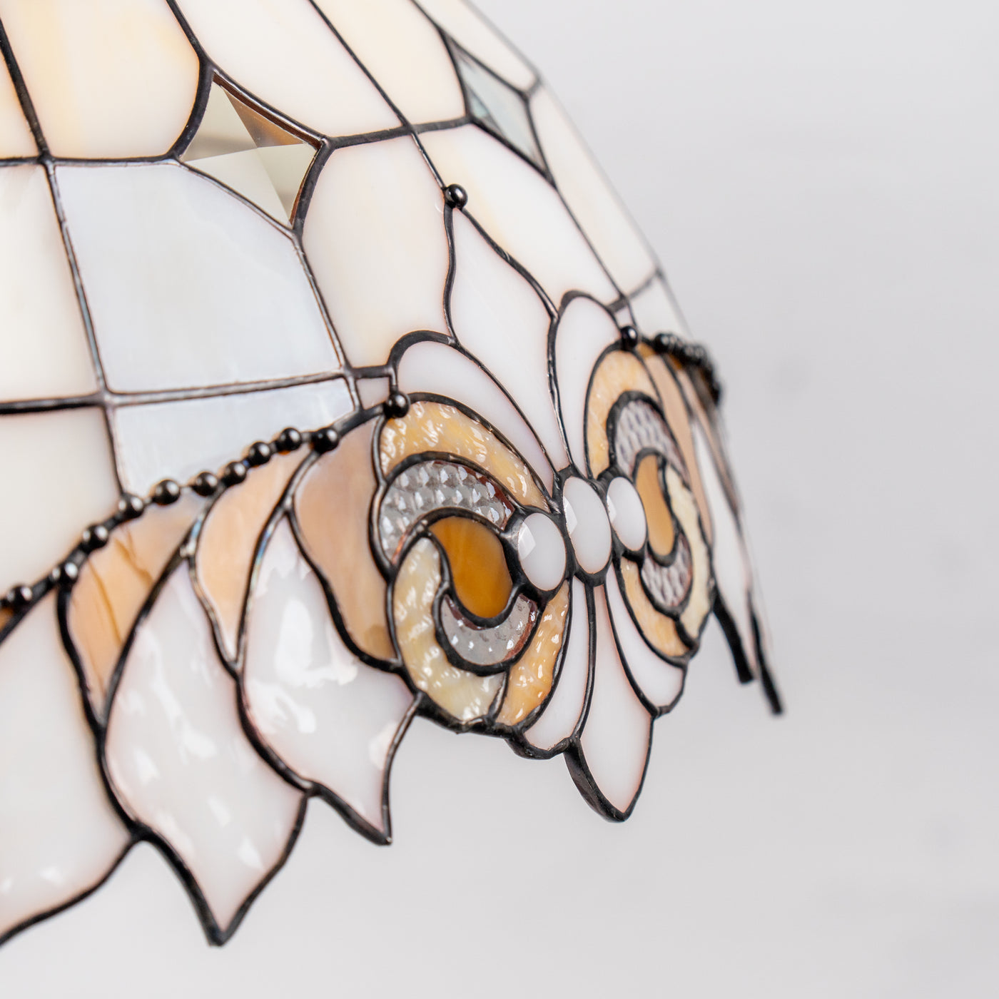 handcrafted lamp with white inserts made of stained glass