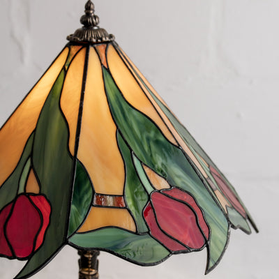 red tulip flower ornament is part of stained glass tiffany style lamp