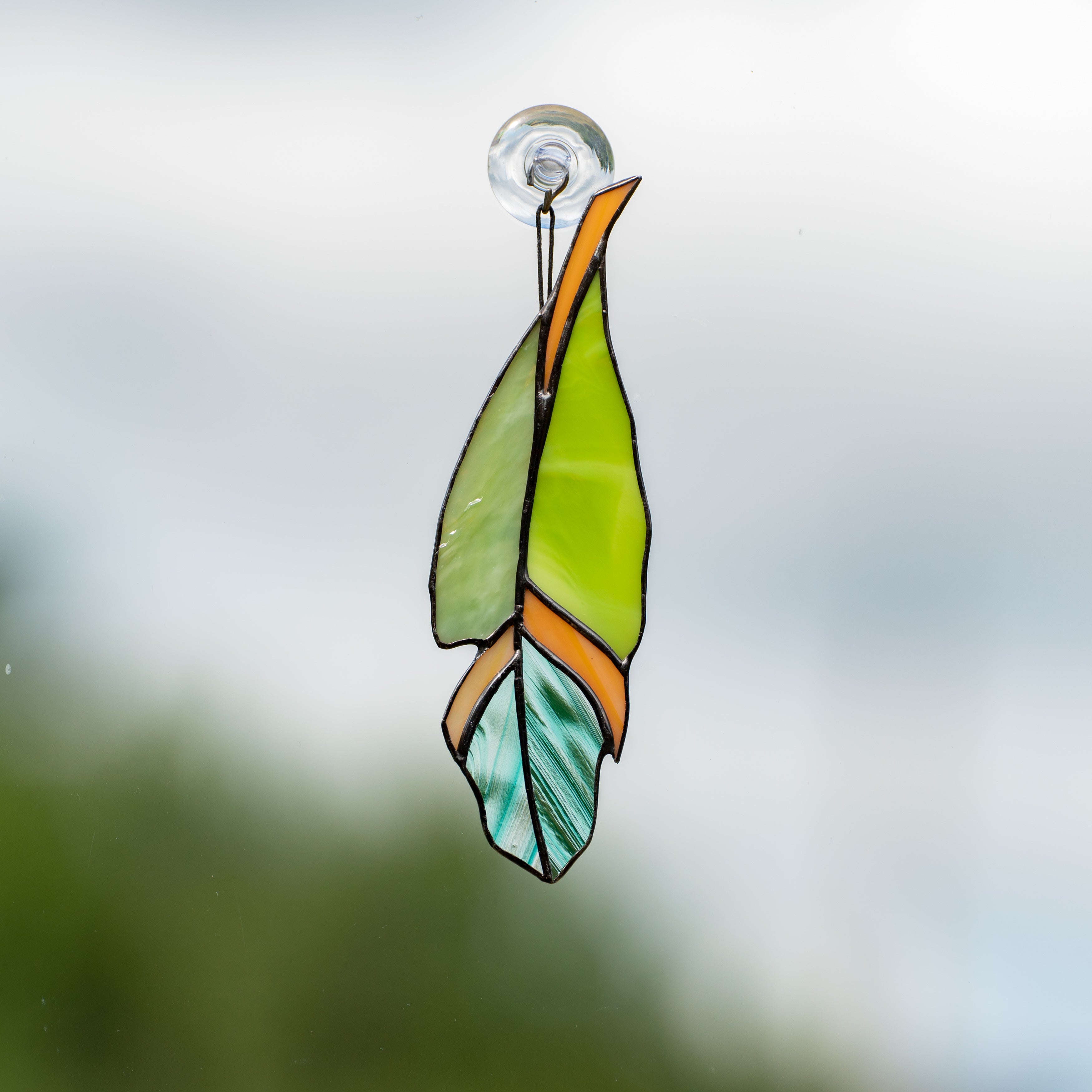 Green Feather with Orange Details - Stained Glass Suncatcher