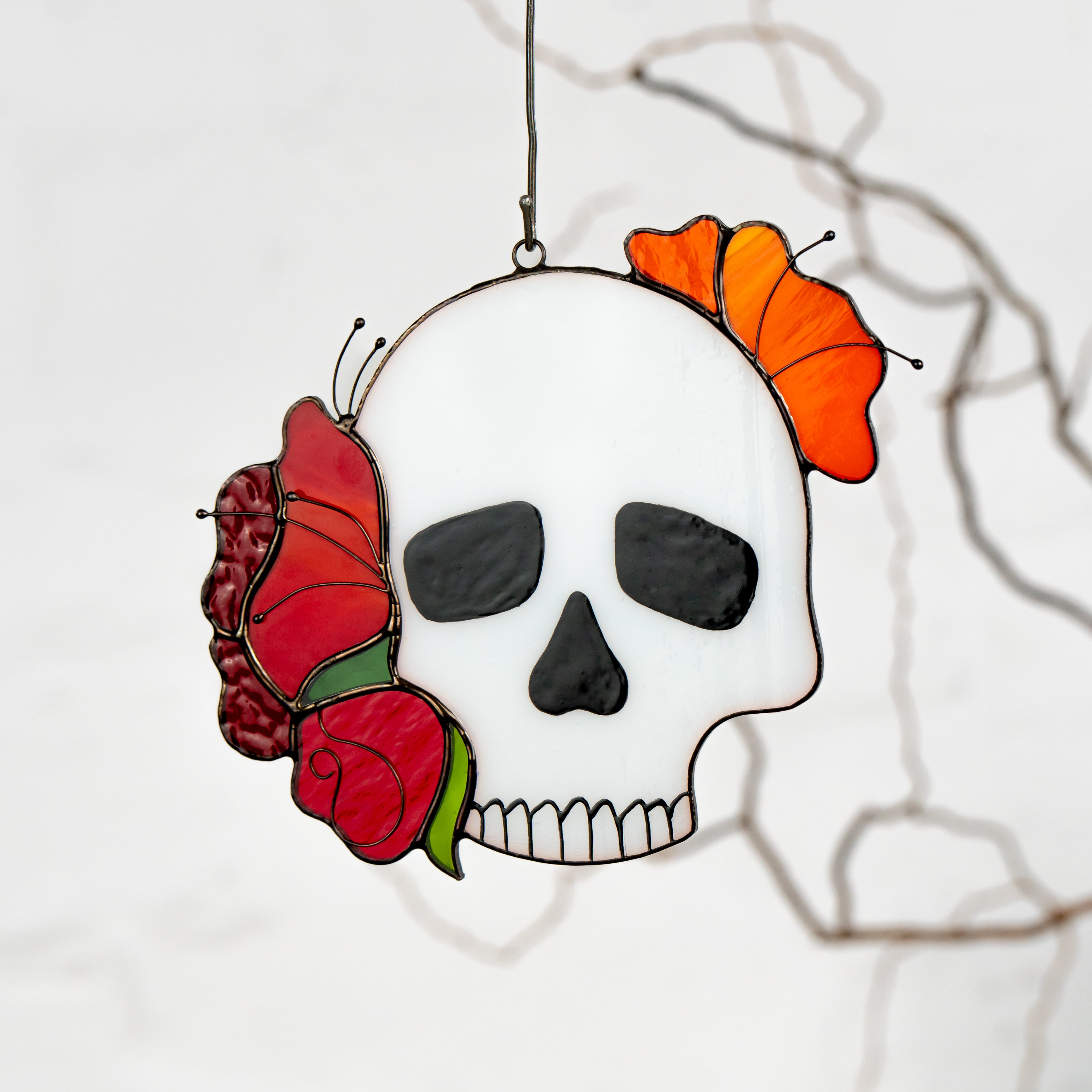 white skull light catcher made of stained glass