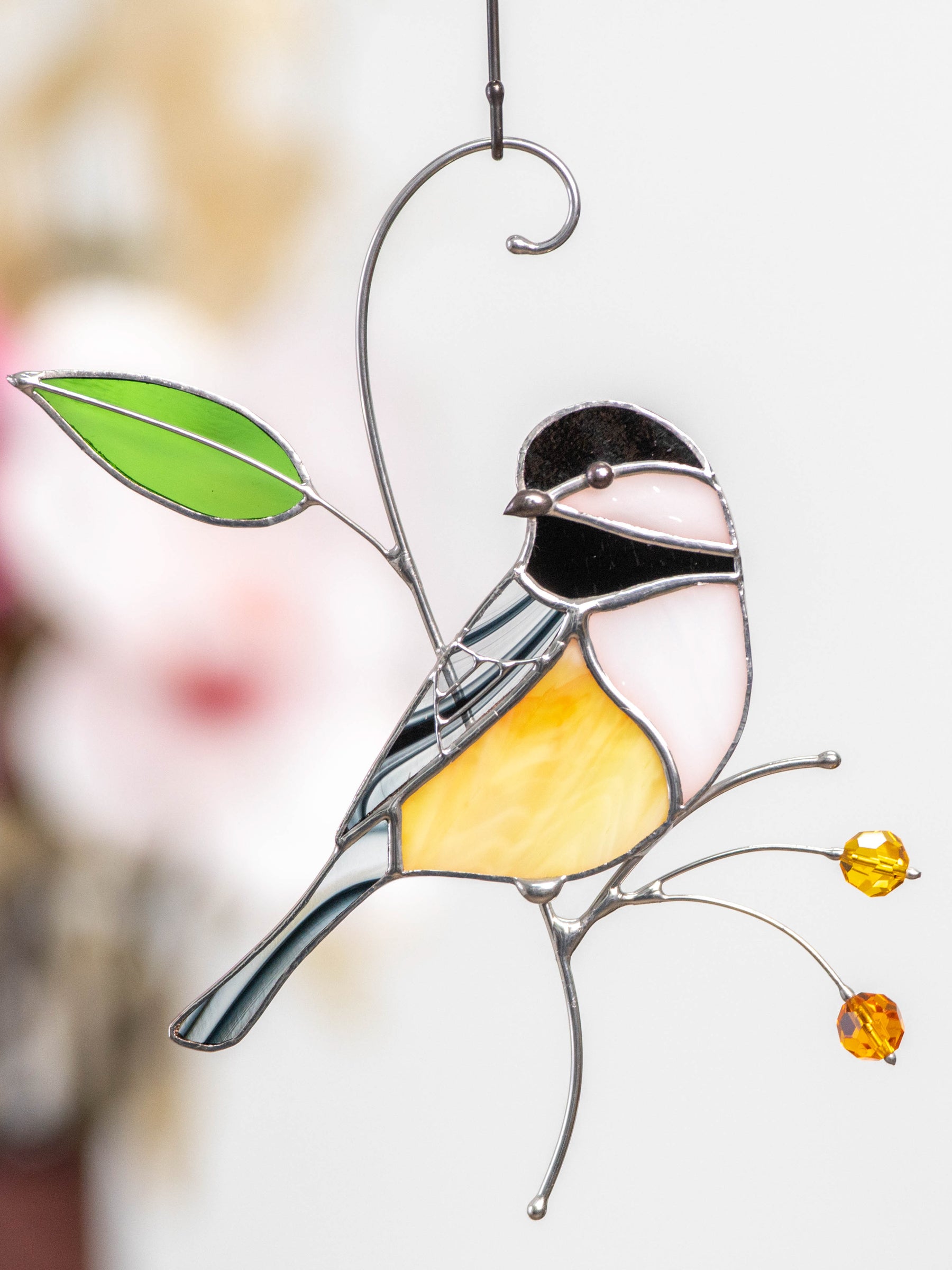 Stained glass chickadee on the branch suncatcher