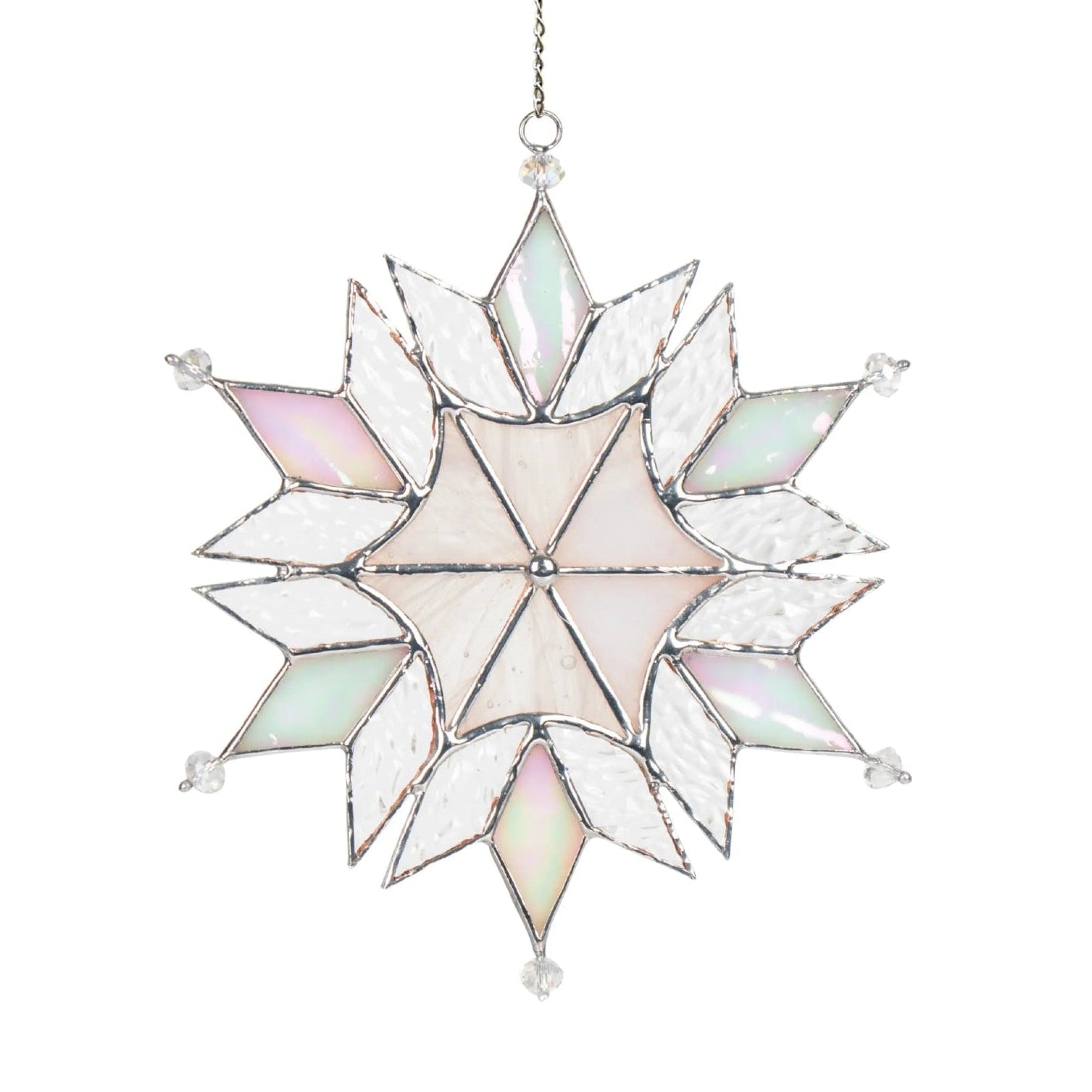 Stained galss snowflake ornament with a chain on a white background