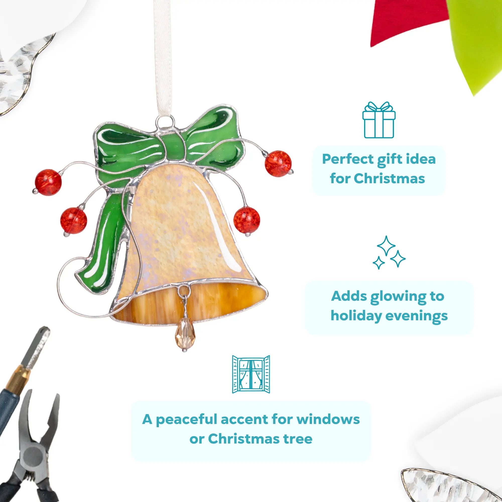 Decorative stained glass bell with green bow and red beads as a perfect gift idea for Christmas