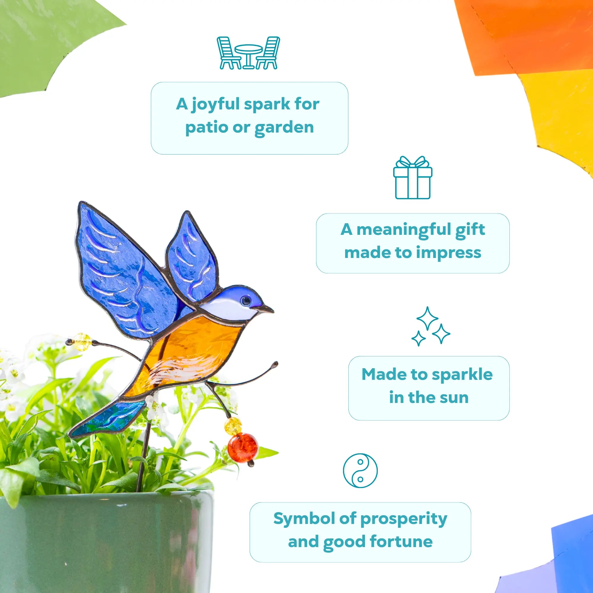 Decorative stained glass bluebird plant stake in a pot as a meaningful gift made to impress