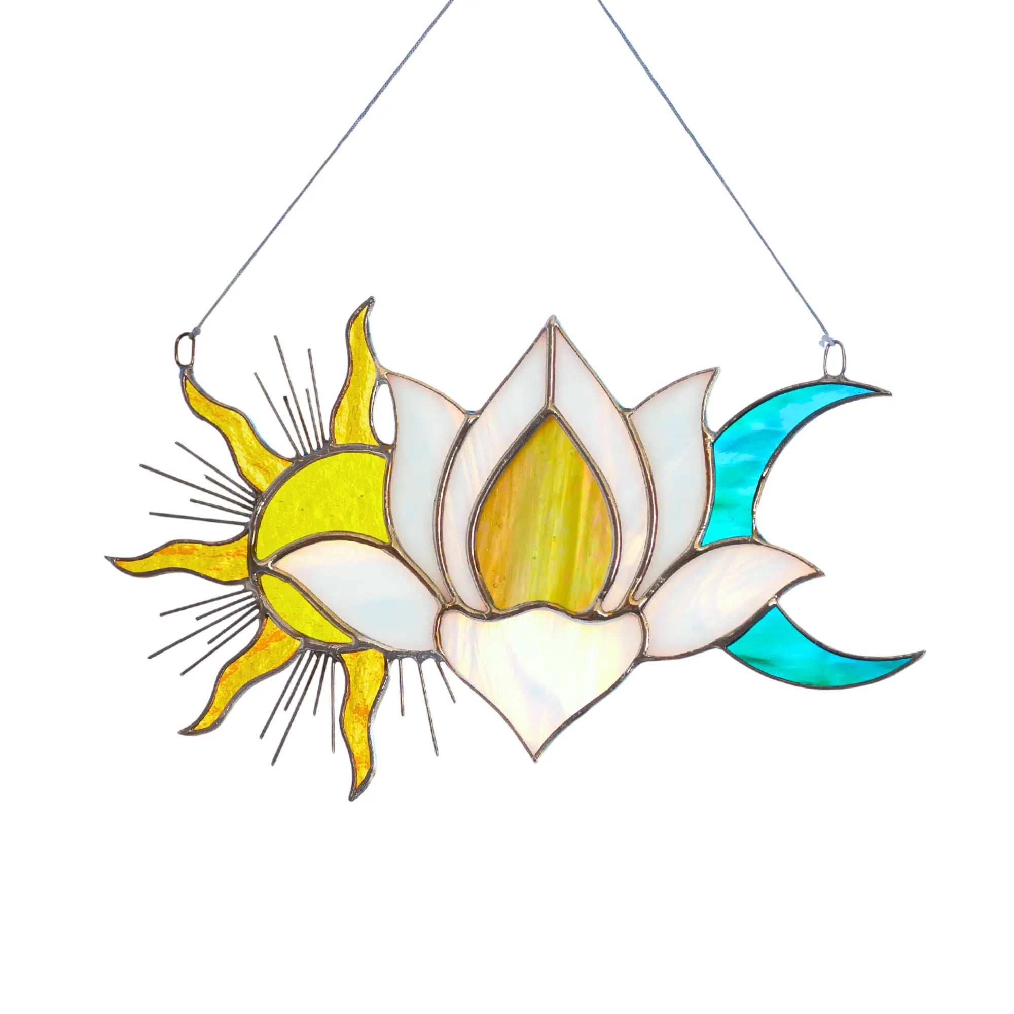 Stained glass suncatcher with sun, moon, and lotus flower design on a white background.