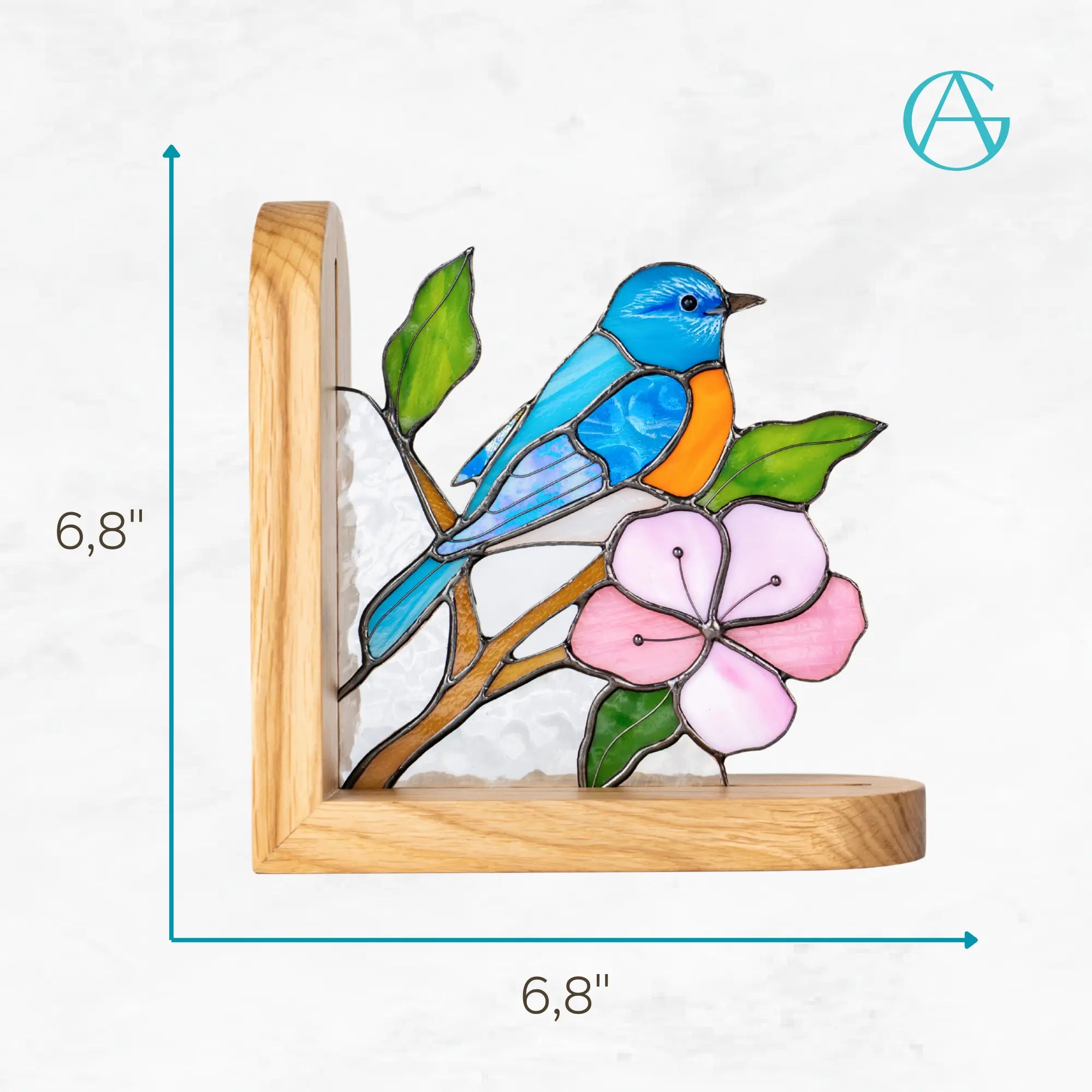Stained glass bookend with a bluebird and pink flower on a wooden base, with dimensions indicated: 6,8 x 6,8 inches