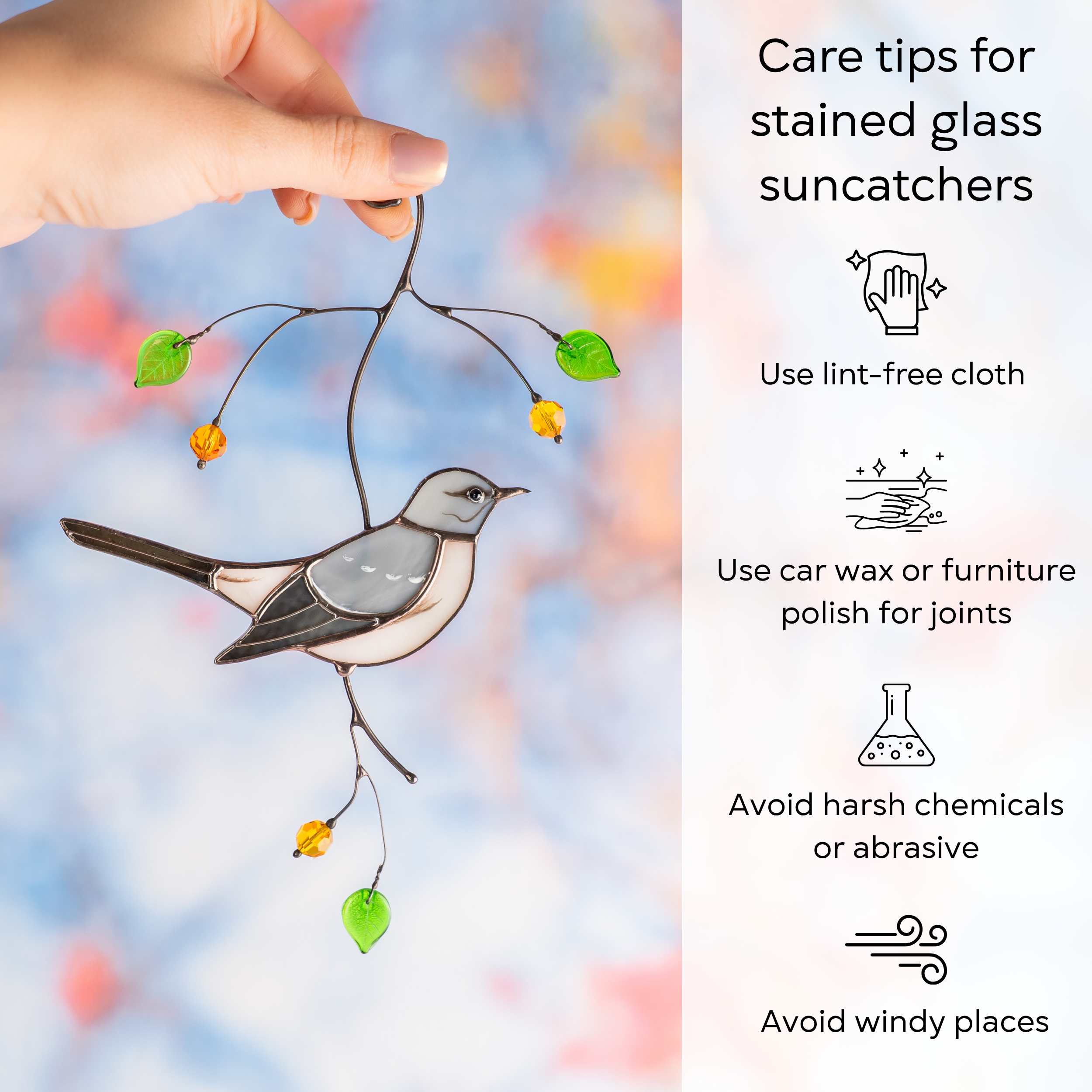 Hand holding stained glass mockingbird with colorful background and care instructions beside it: use lint-free cloth, use wax polish for joints, no harsh cleaners, avoid wind.