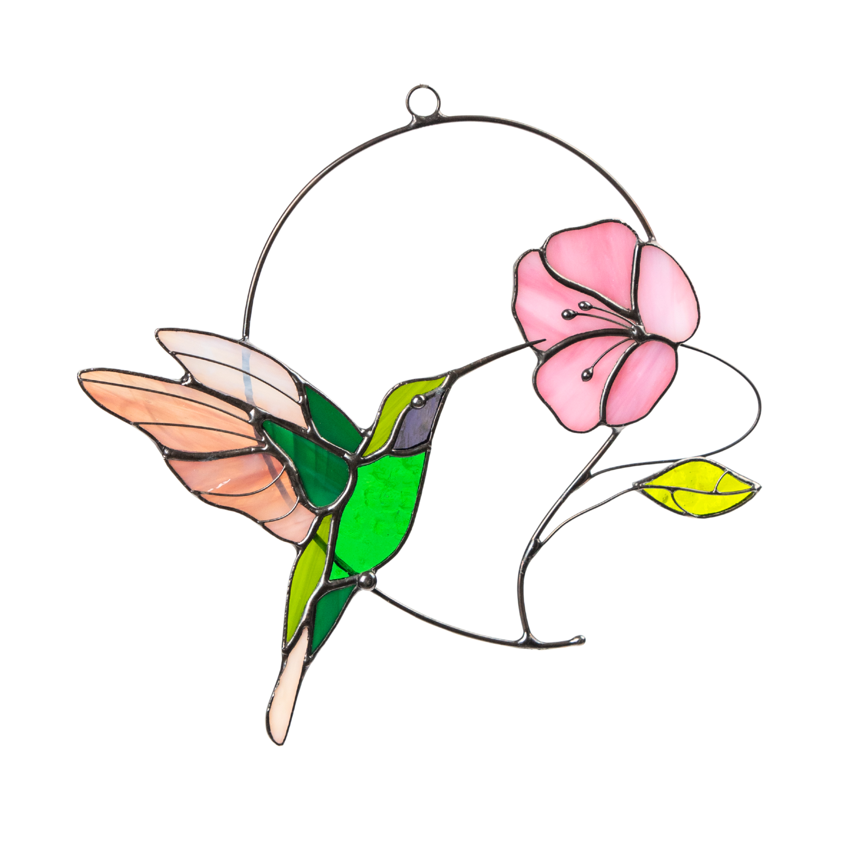 Green stained glass hummingbird with soft pink wings and flower, casting shadow on white surface
