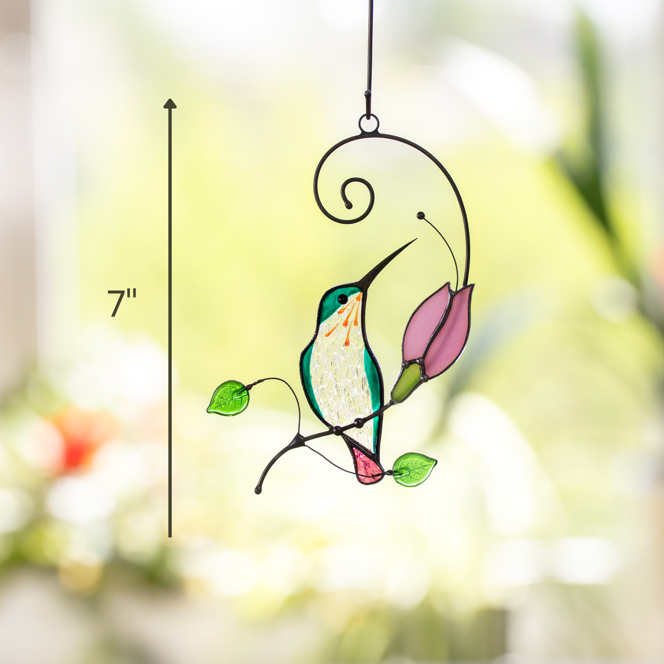 Hummingbird stained glass suncatcher next to a pink flower, perfect size - 7 inches, for window or garden decoration