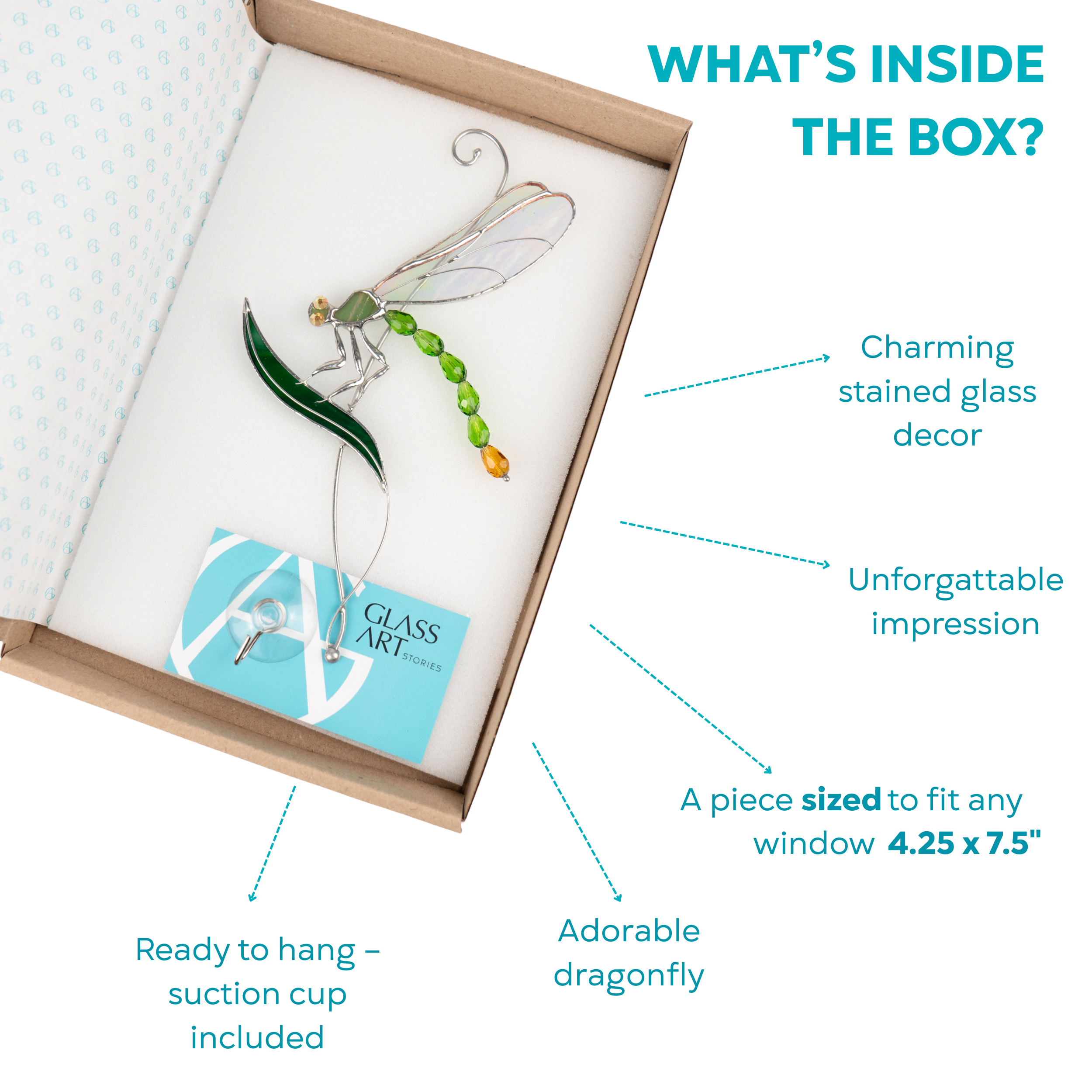 Boxed stained glass dragonfly with green tail and leaf base, labeled packaging highlights features.