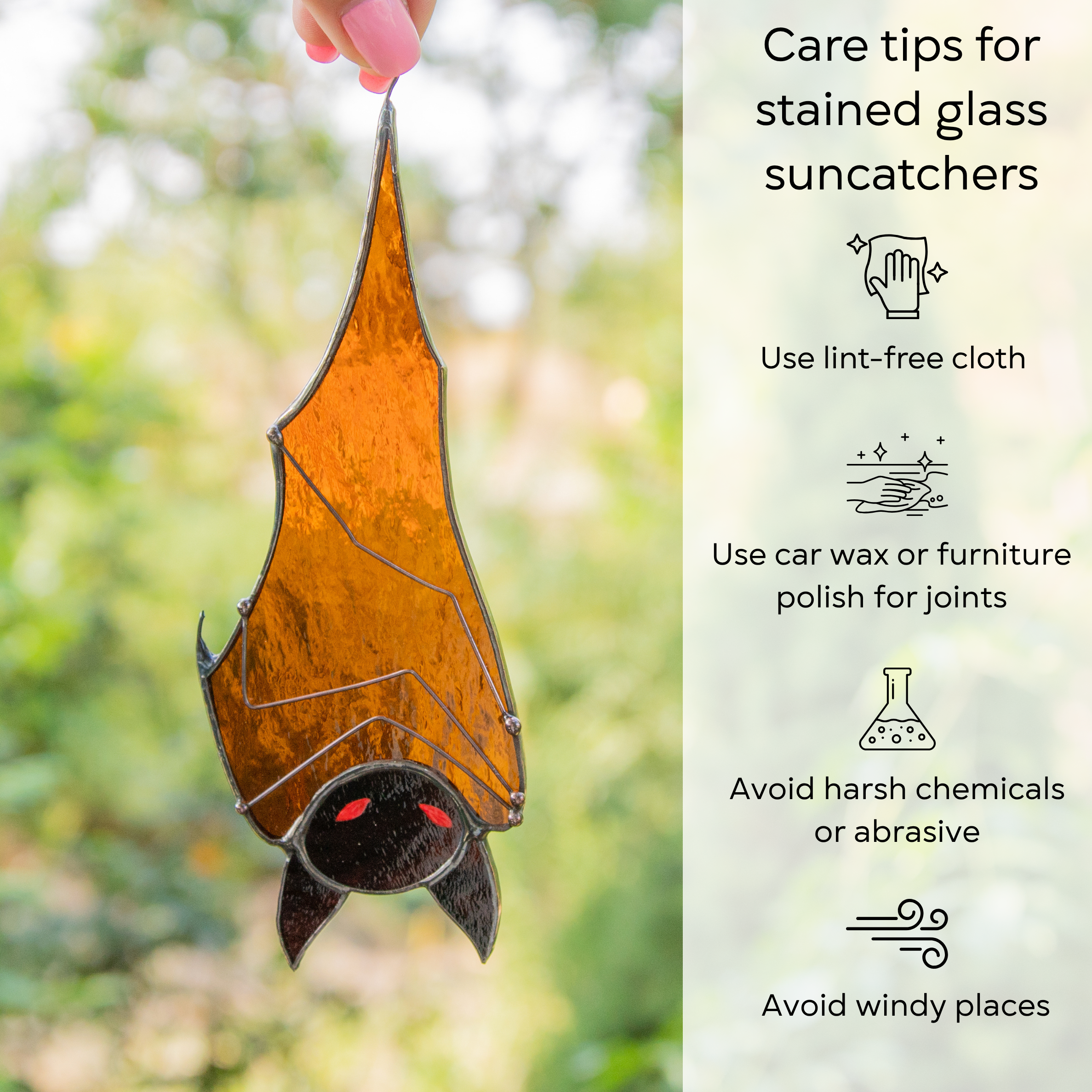 Transparent stained glass bat held by hand outdoors, paired with care tips infographic: use lint-free cloth, polish joints with car wax or furniture polish, avoid harsh chemicals, and windy places.