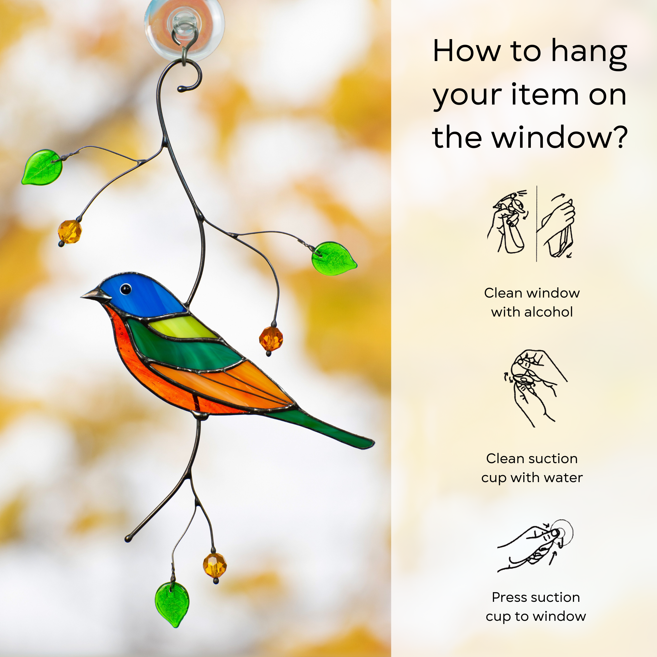 Bunting bird suncatcher hanging with illustrated instructions on window cleaning and suction cup use: clean window and suction cup, press a cup to the surface.
