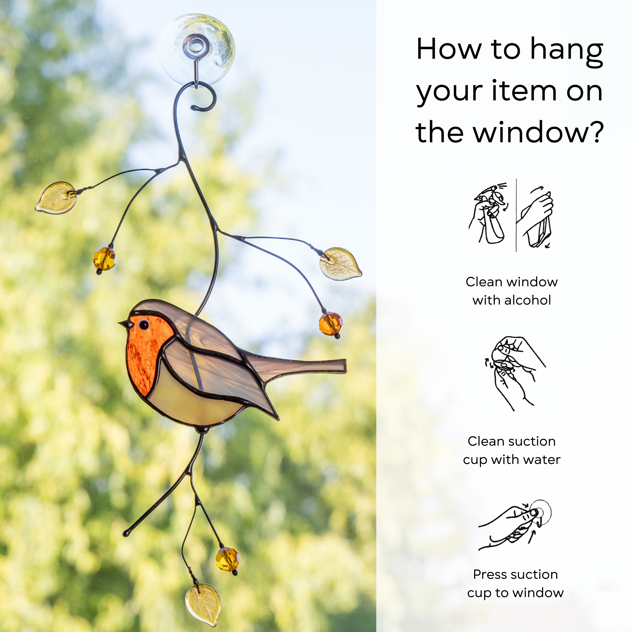 Robin suncatcher shown hanging on glass with step-by-step instructions for proper suction cup use: clean window and suction cup, press a cup to the surface