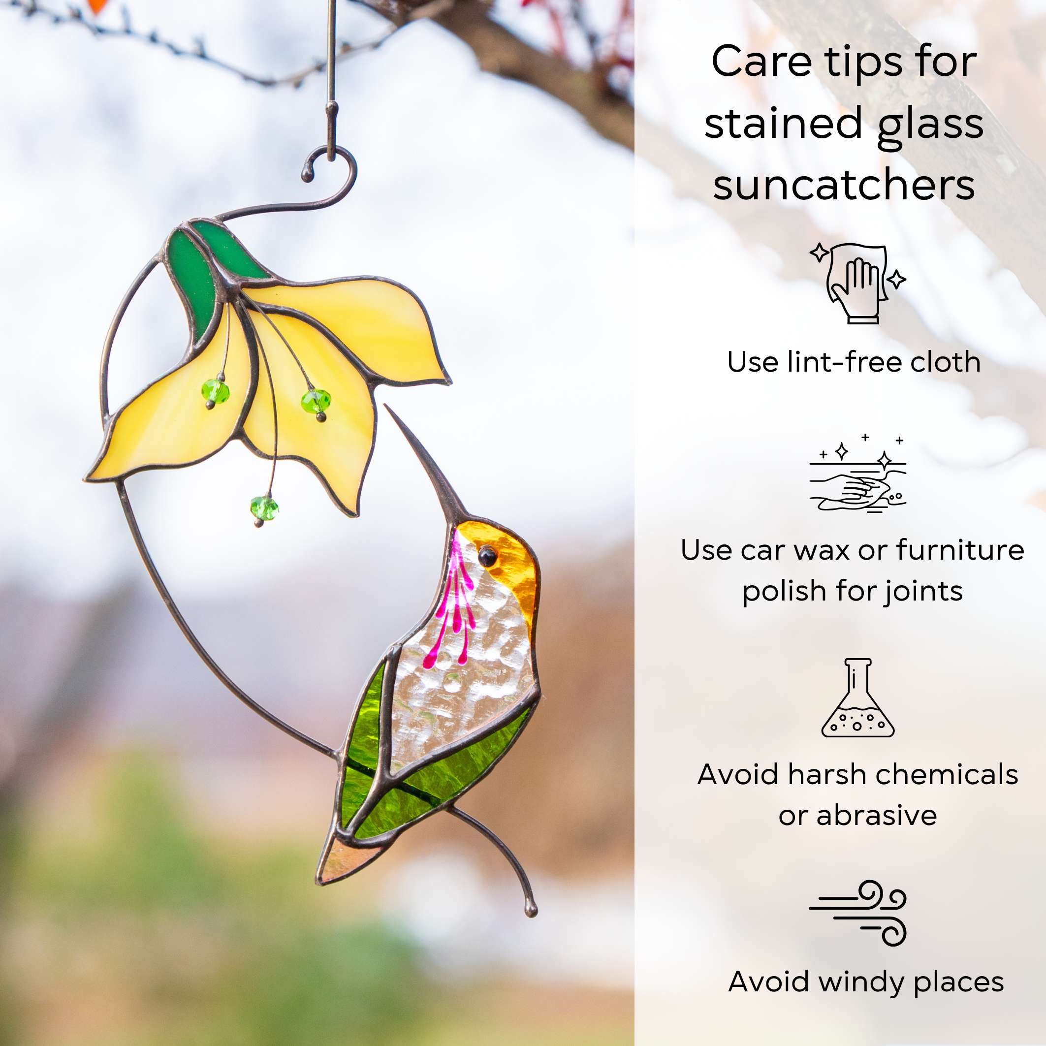Care tips infographic beside yellow flower and hummingbird stained glass suncatcher outdoors: use lint-free cloth, polish joints with car wax or furniture polish, avoid harsh chemicals, and windy places.