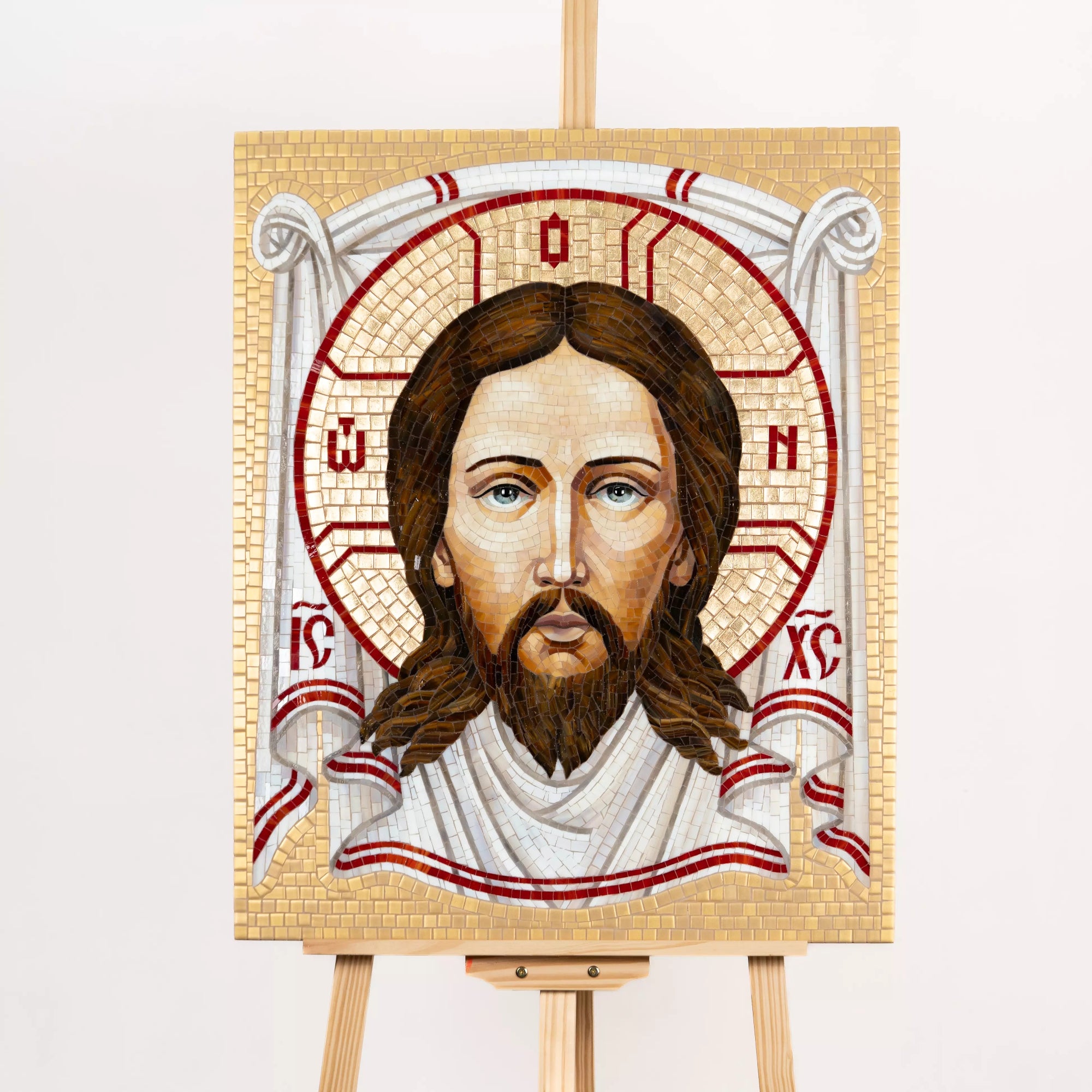 Staiend glass mosaic Image of Edessa on an easel with a white background