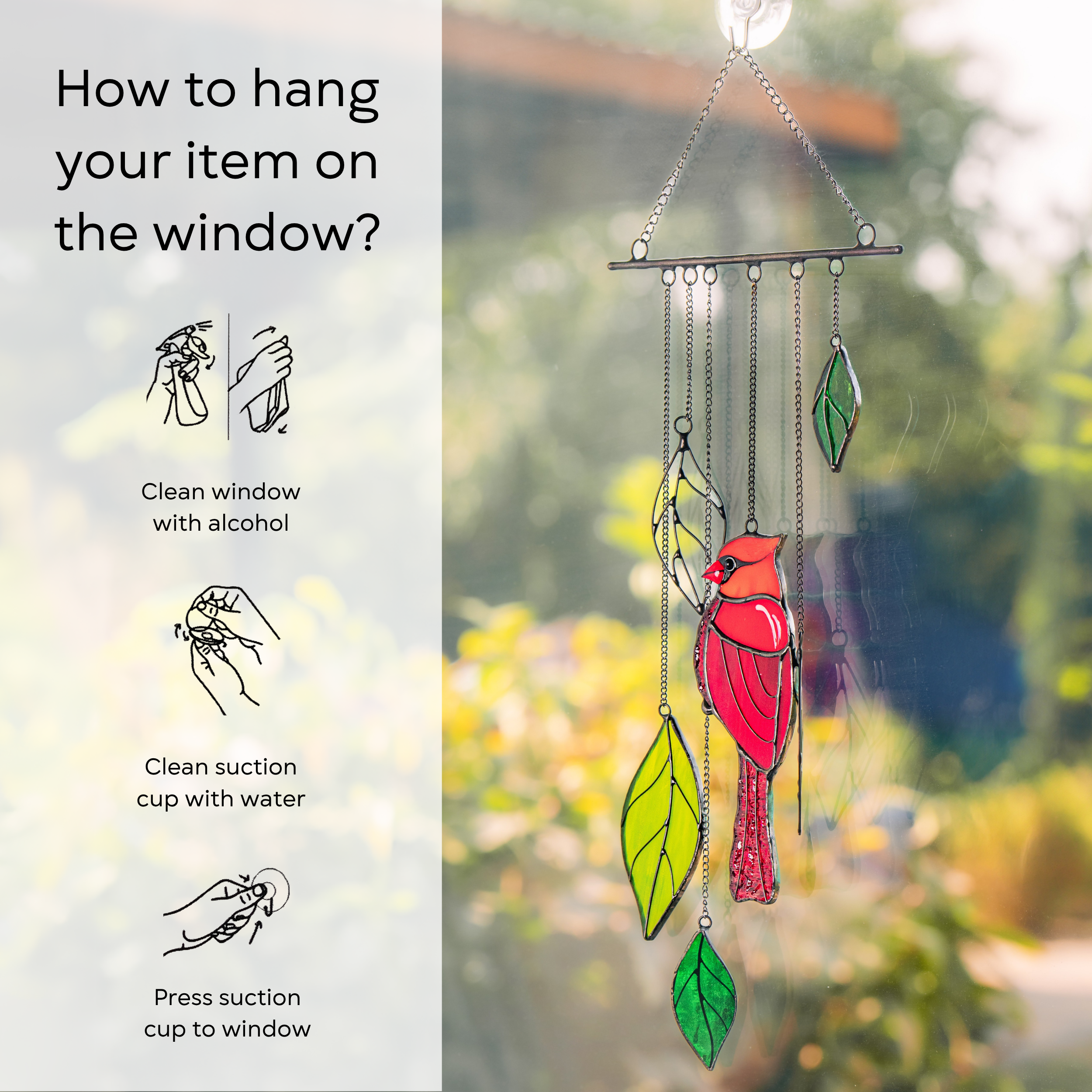 Cardinal wind chime on a sunlit window with hanging instructions and cleaning tips shown on the side: clean window and suction cup, press a cup to the surface.