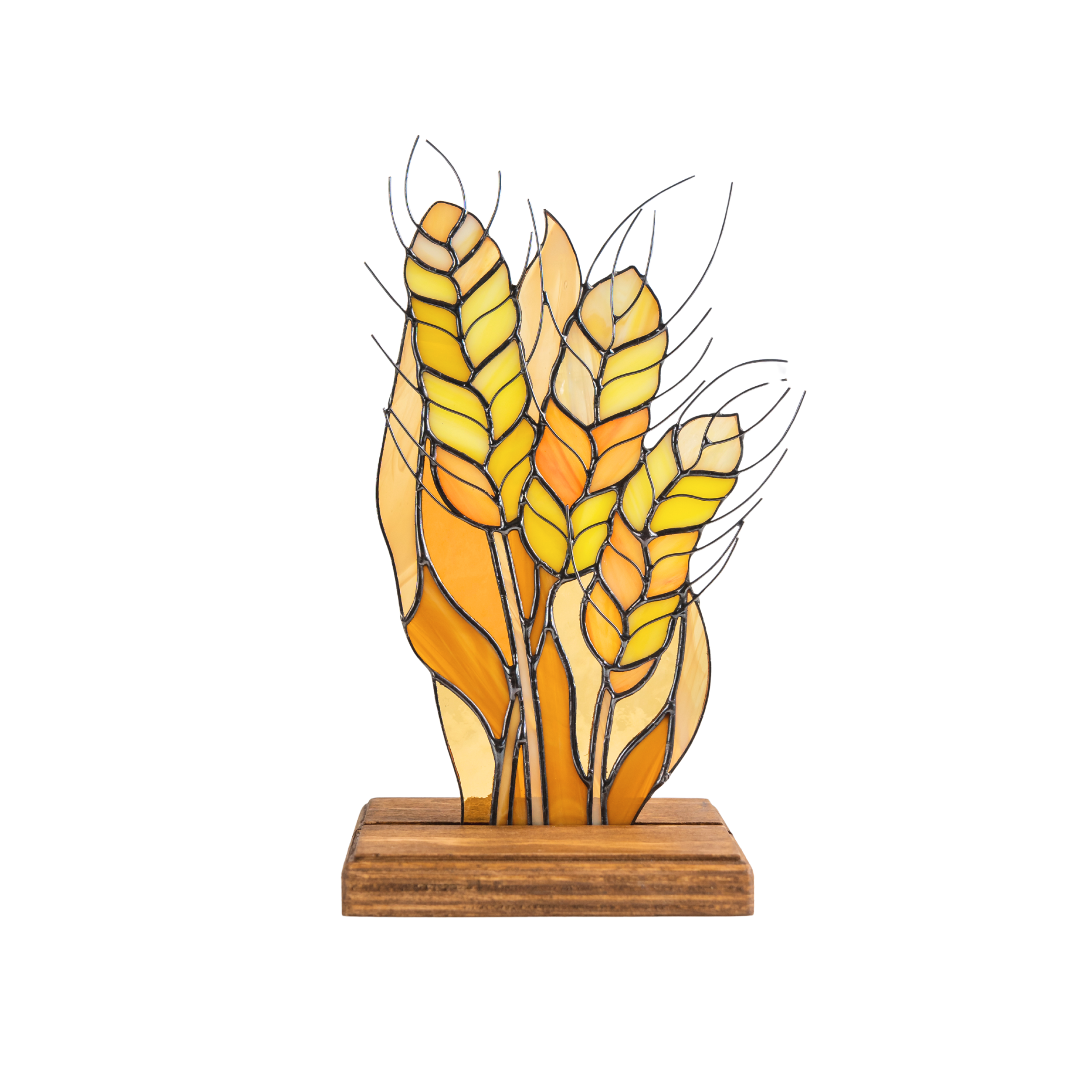 Wheat stained glass panel in yellow and orange tones on a wood base.