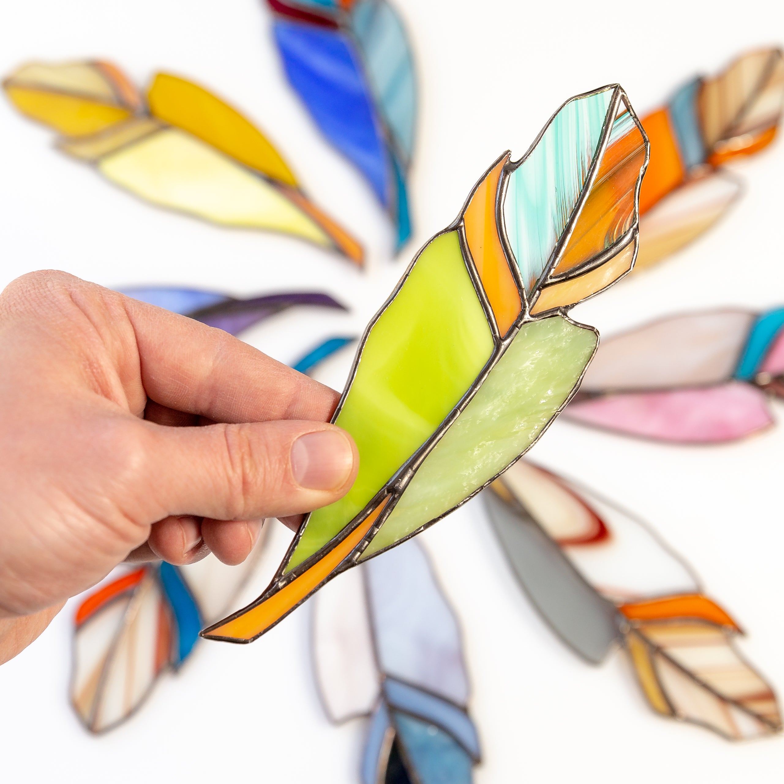 Green Feather with Orange Details - Stained Glass Suncatcher