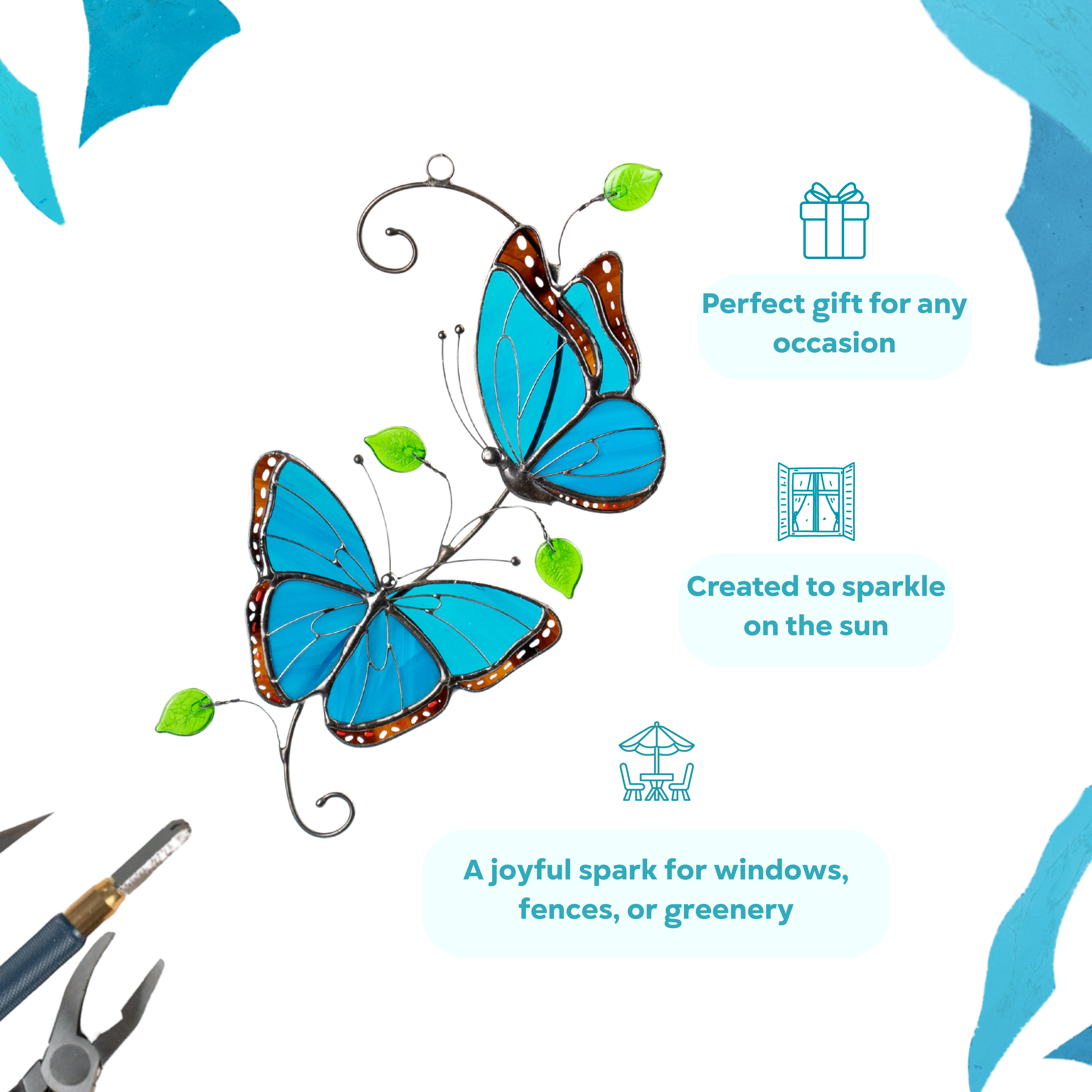Blue morpho stained glass butterflies with brown wing accents and green leaves, ideal as a decorative hanging.