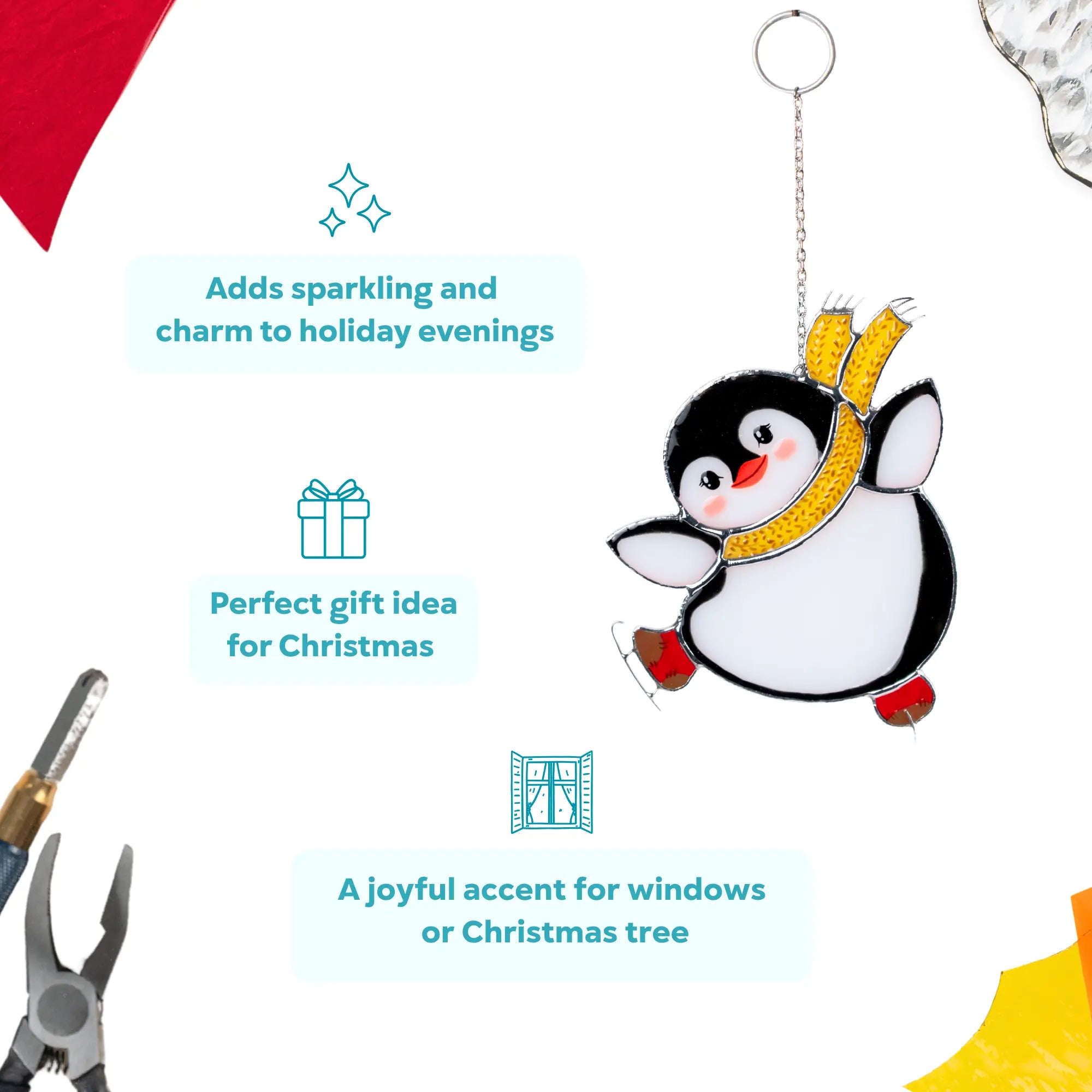 Penguin stained glass suncatcher with decorative scarf on a white background