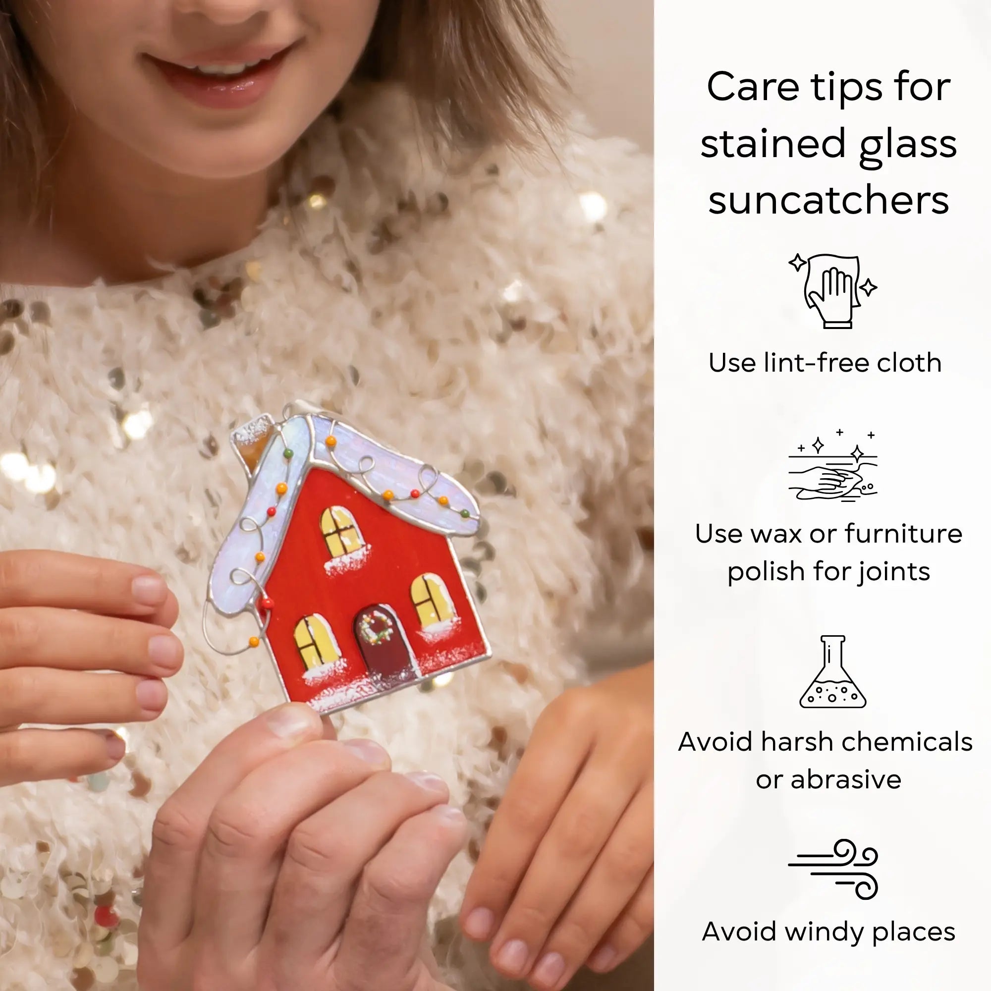 Person holding a stained glass gingerbread house ornament with care tips on the right side: use lint-free cloth, polish joints with car wax or furniture polish, avoid harsh chemicals, and windy places.