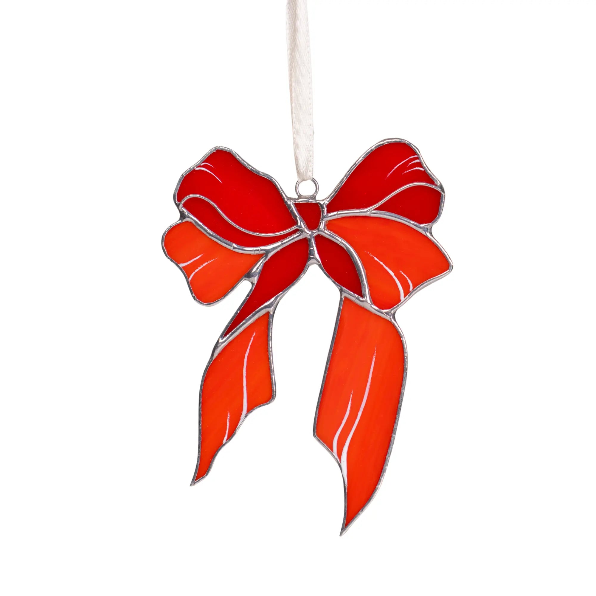 Red bow stained glass suncatcher on a white background
