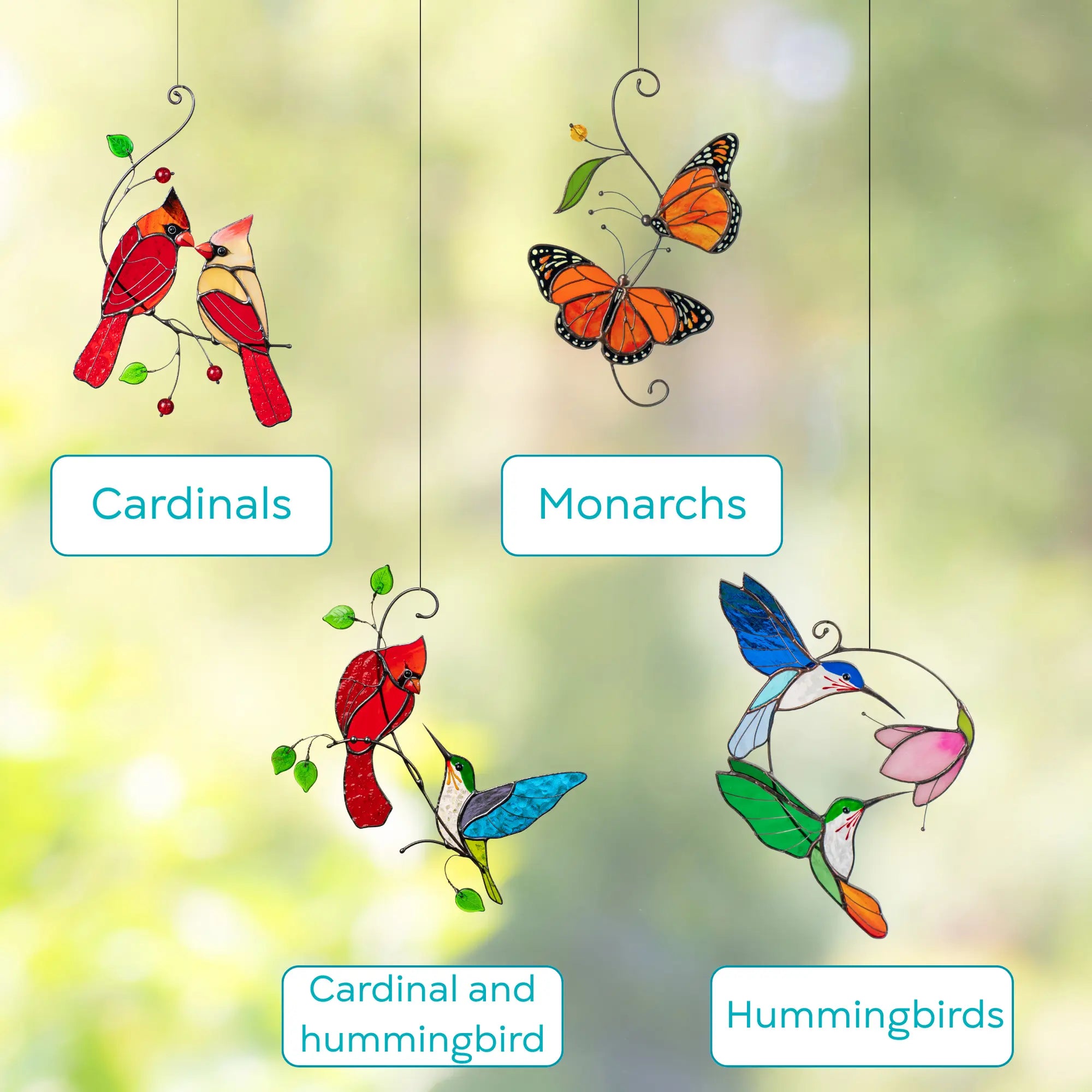 Variation of stained glass window hangings featuring cardinals, monarchs, a cardinal and hummingbird, and hummingbirds.
