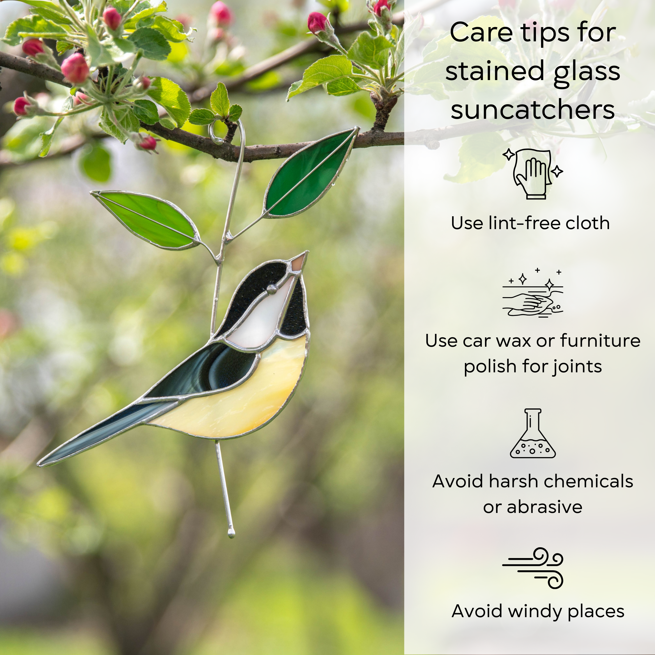 Stained glass chickadee hanging from blooming tree, surrounded by green leaves and pink flower buds, with care tips for suncatchers