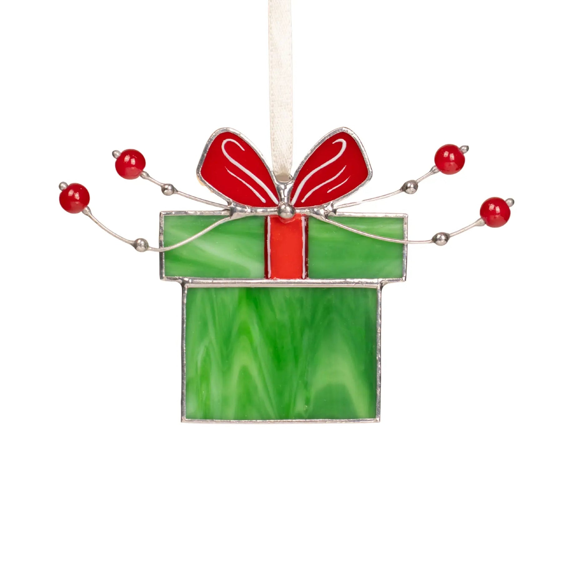 Stained glass green gift box with red ribbon, decorated with red beads and bow