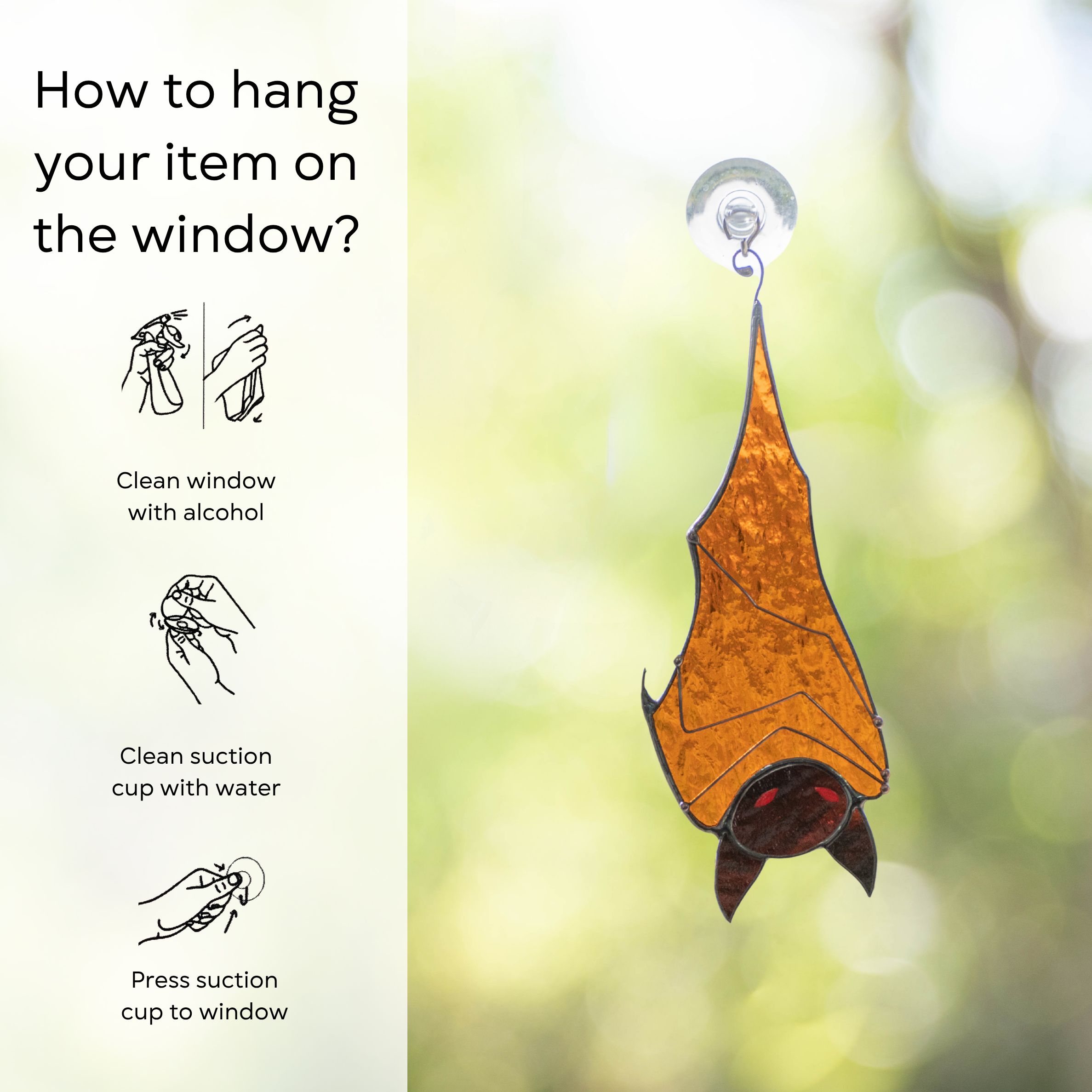 Orange glass bat hanging on window with installation tips on left side: clean window and suction cup, press a cup to the surface.